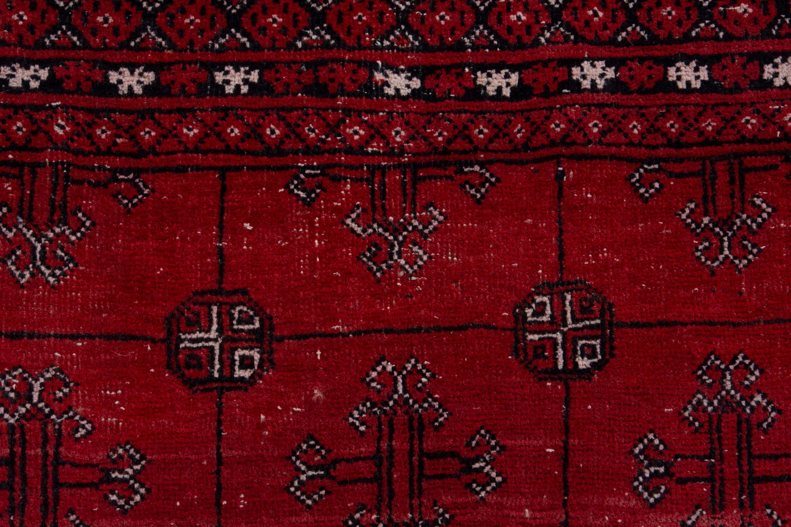 Persian Torkaman area rug in deep red and burgundy, view 14 of 19
