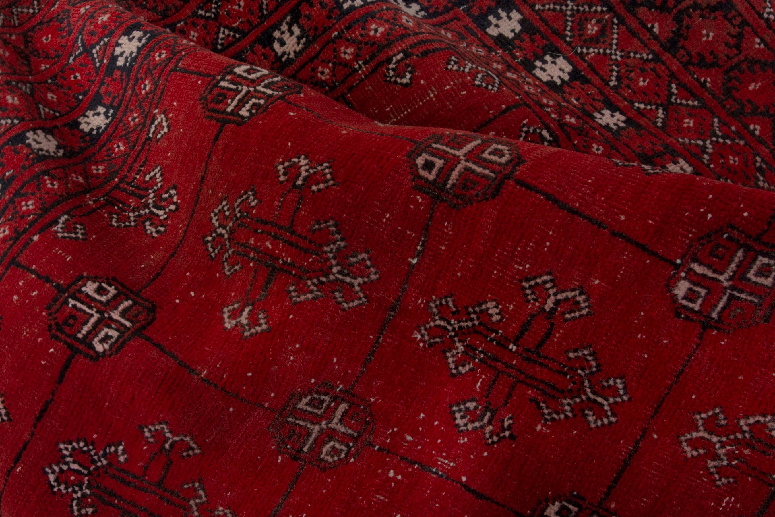 Persian Torkaman area rug in deep red and burgundy, view 18 of 19
