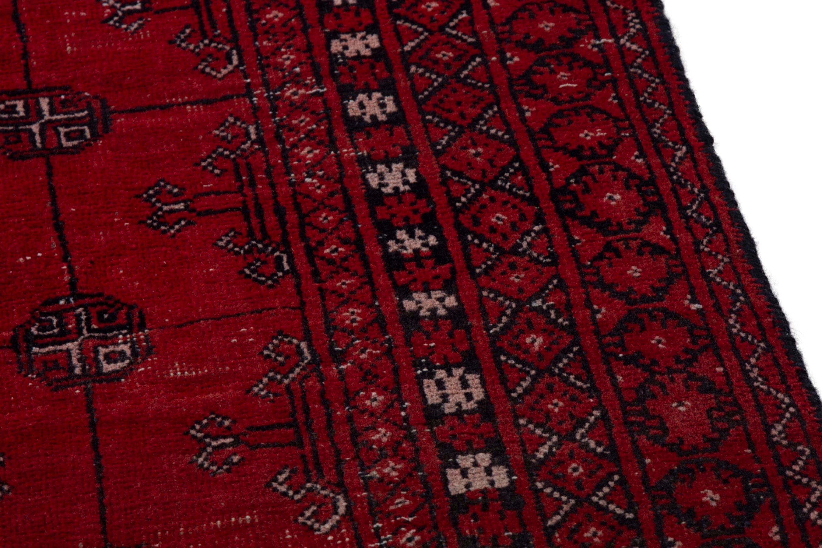 Persian Torkaman area rug in deep red and burgundy, view 7 of 19