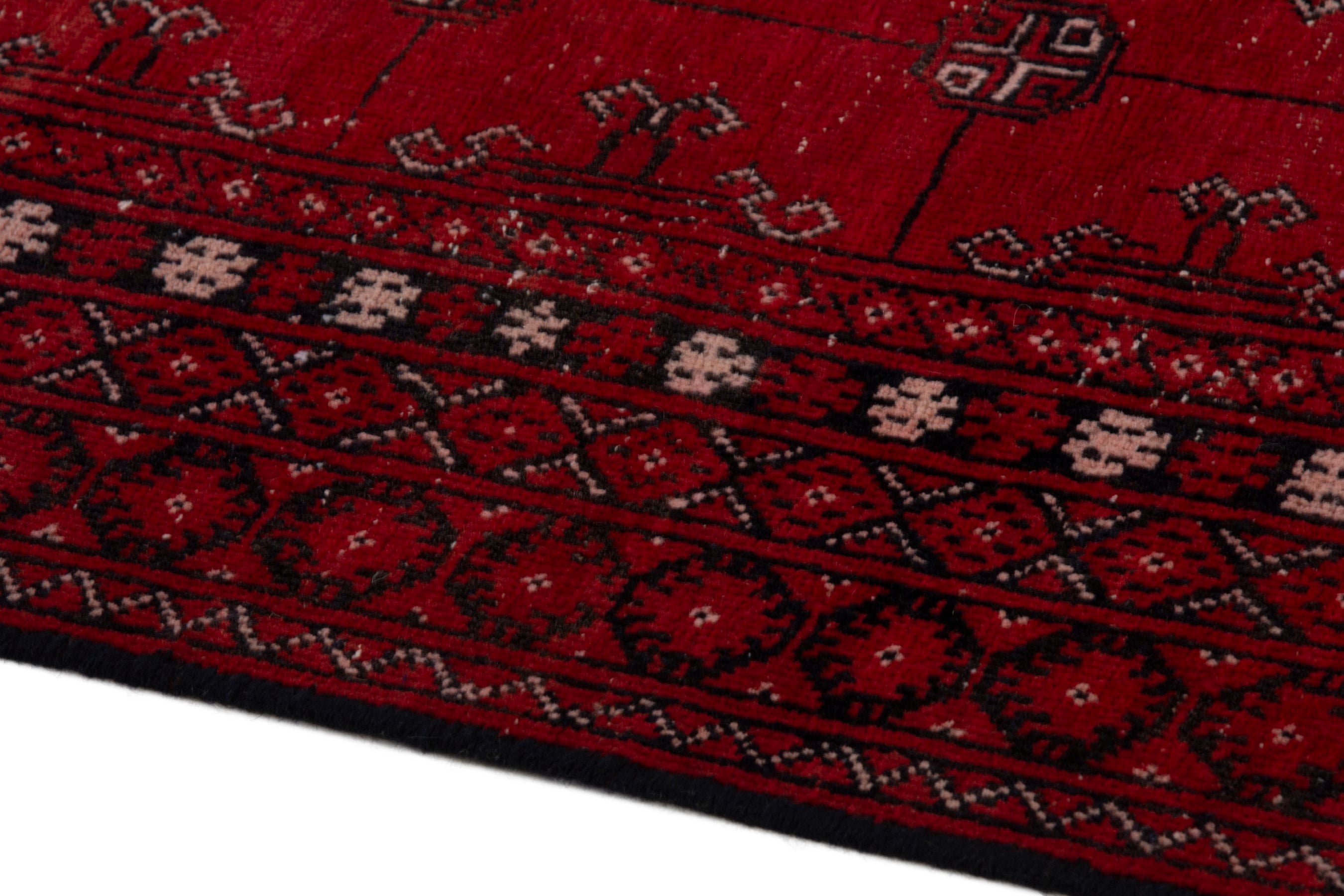 Persian Torkaman area rug in deep red and burgundy, view 8 of 19