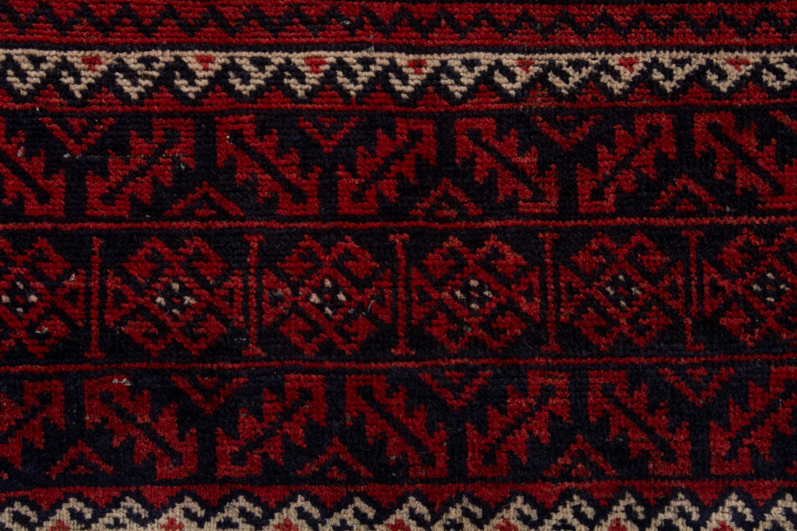 Persian Baluch area rug in burgundy and deep red, view 12 of 18