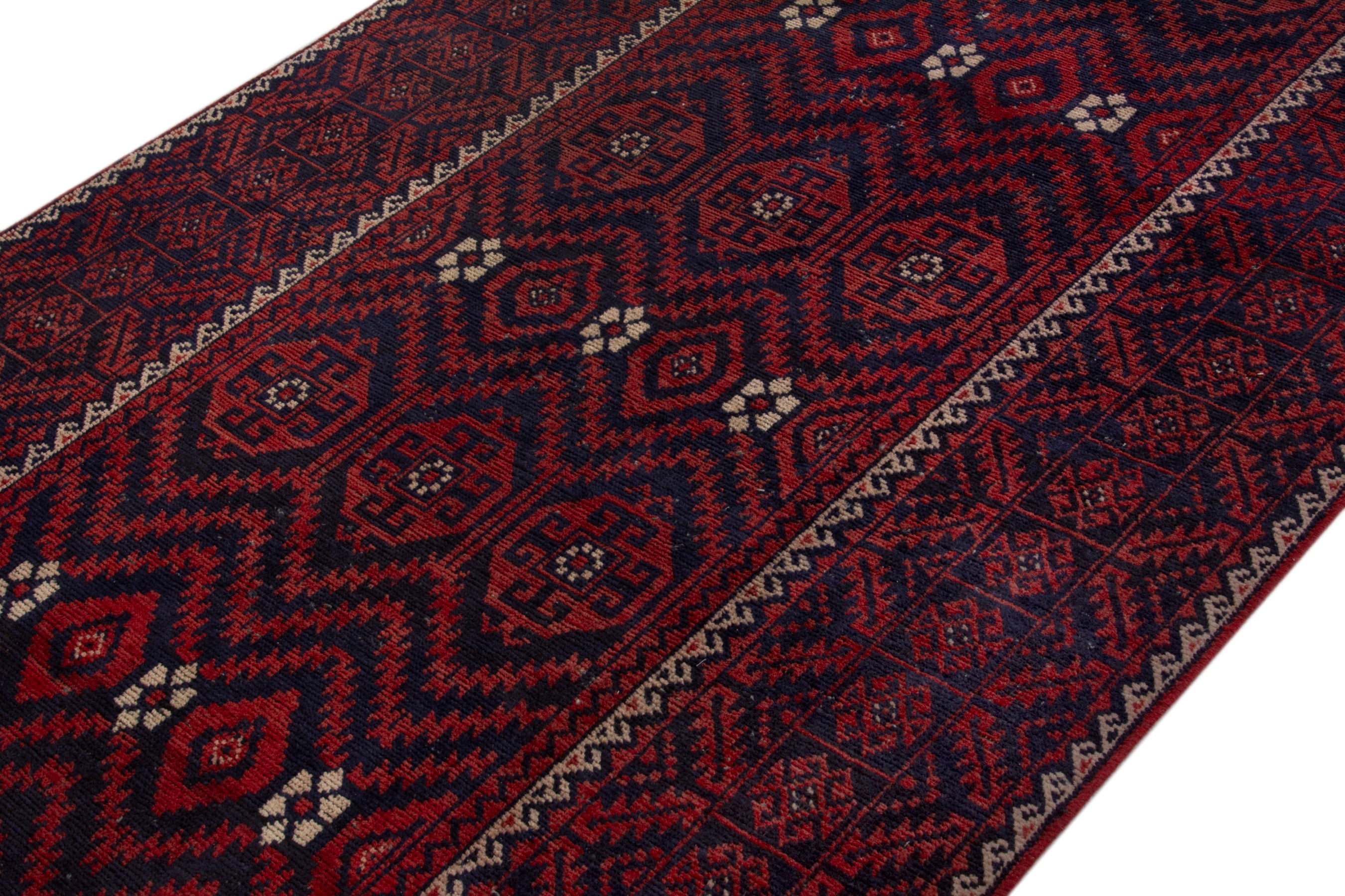 Persian Baluch area rug in burgundy and deep red, view 4 of 18