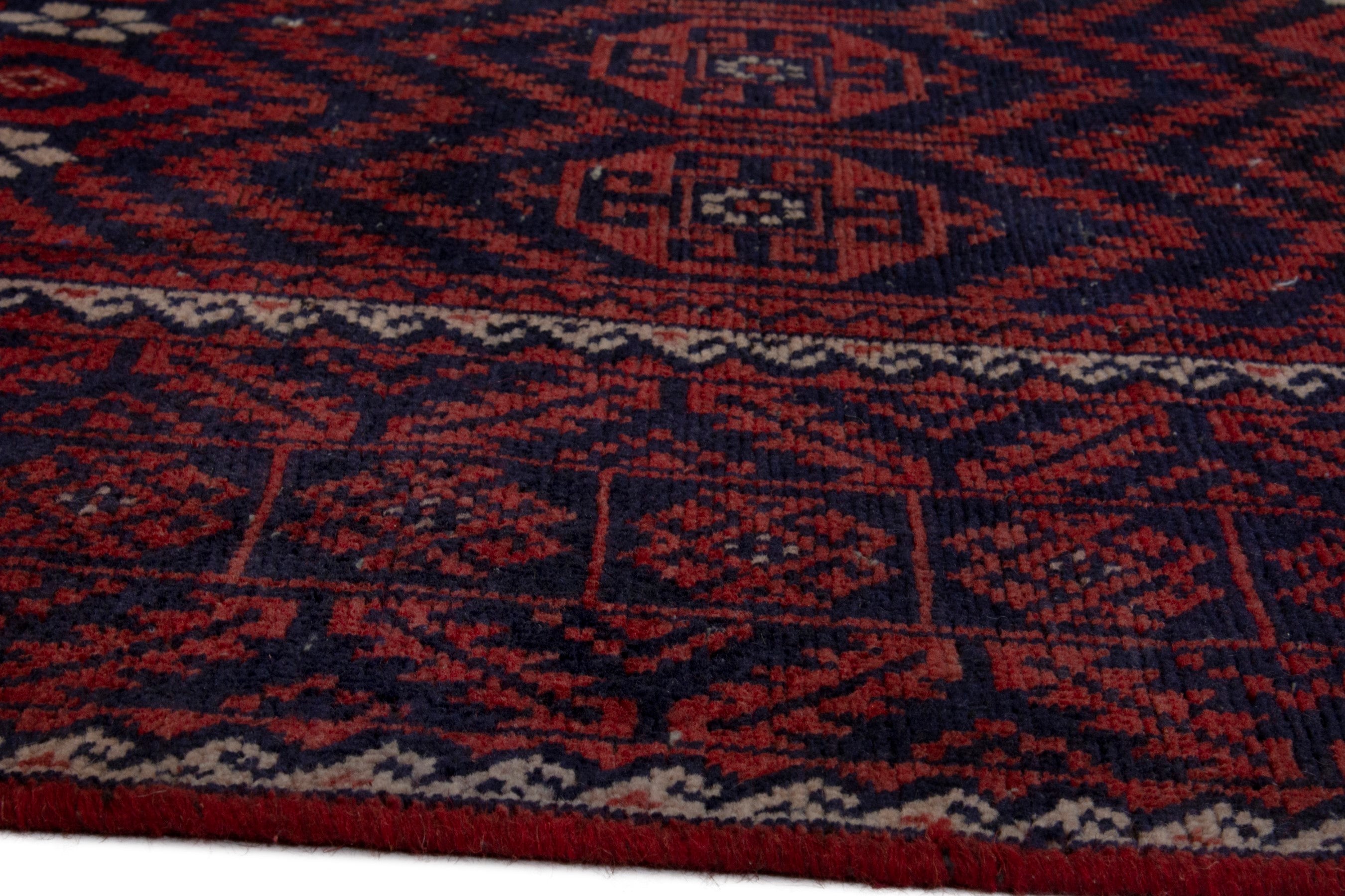 Persian Baluch area rug in burgundy and deep red, view 7 of 18