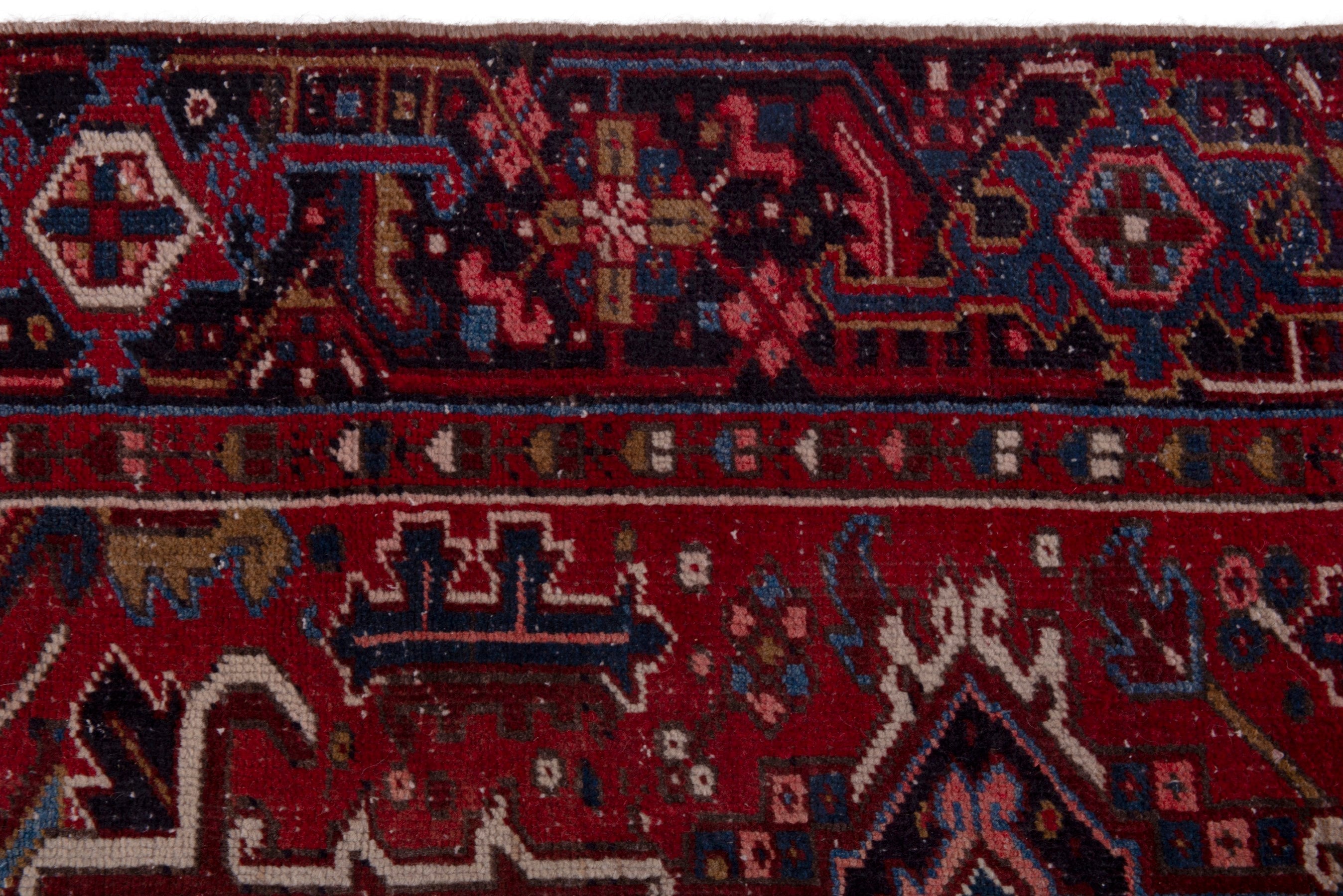 Persian Heriz oversized rug in deep red and cream, view 14 of 21