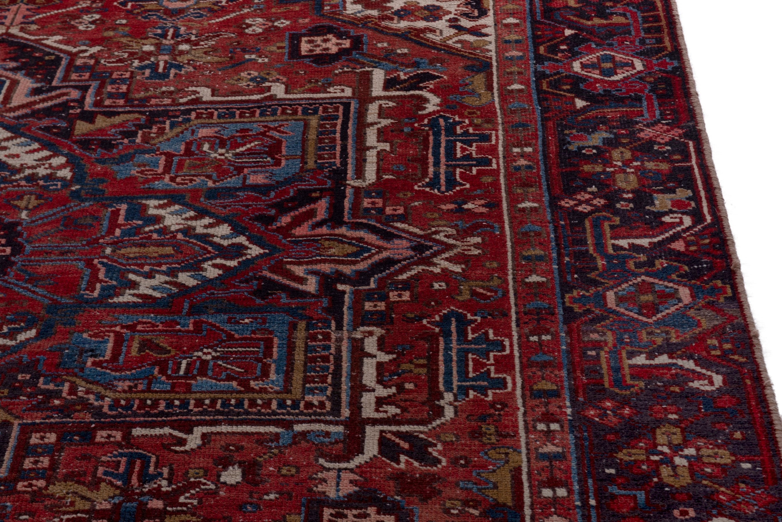 Persian Heriz oversized rug in deep red and cream, view 6 of 21
