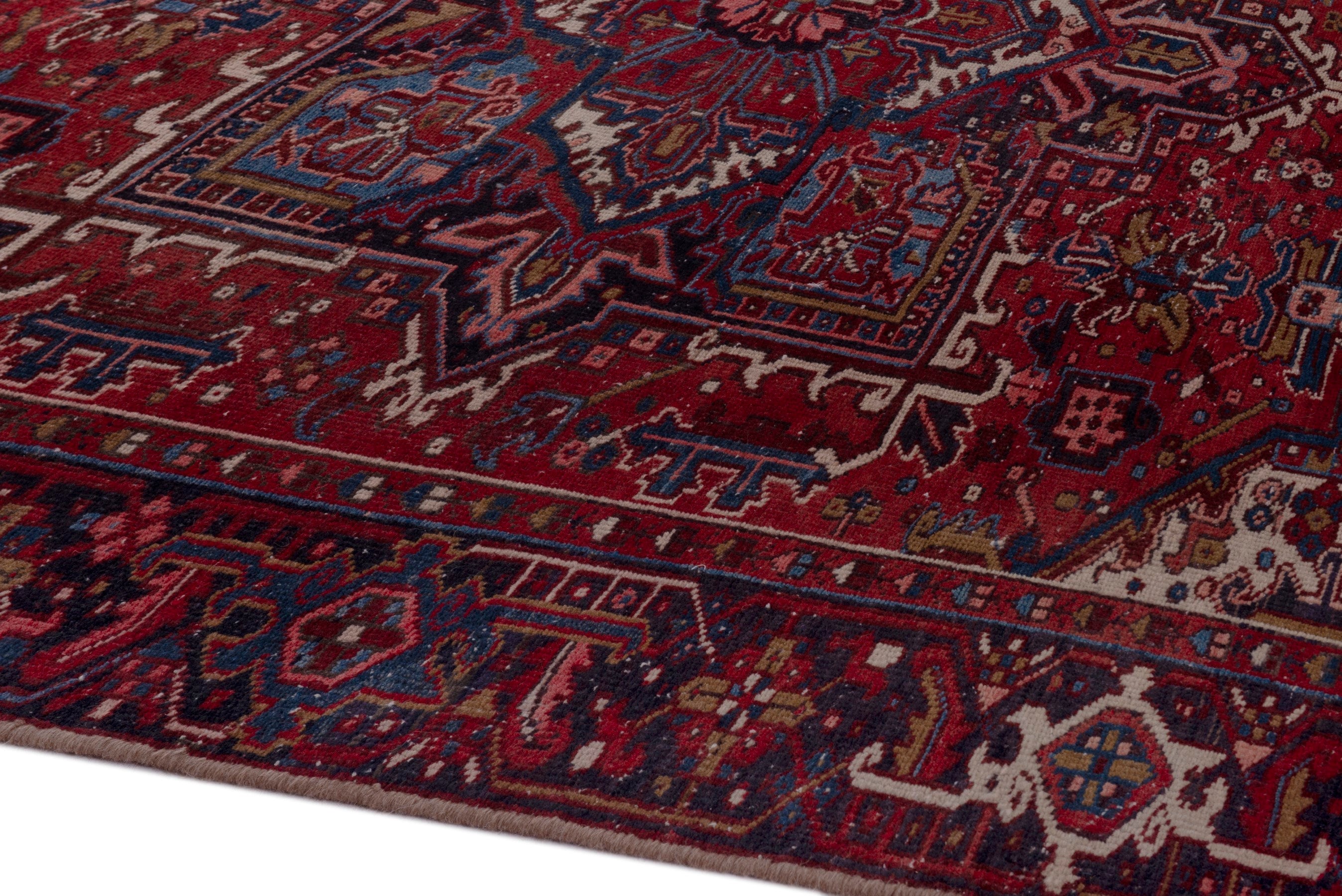 Persian Heriz oversized rug in deep red and cream, view 7 of 21