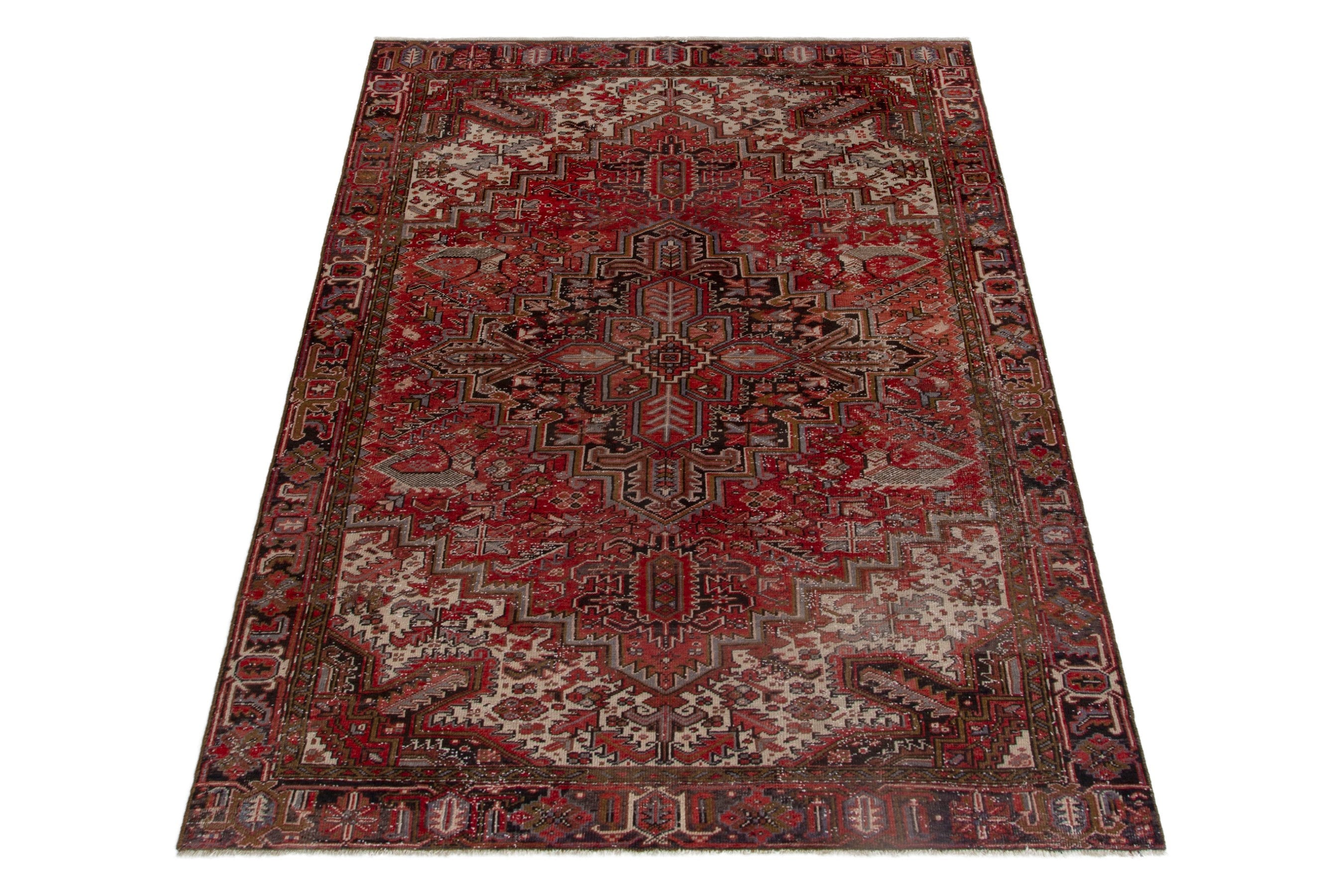 Persian Heriz oversized rug in deep red and burgundy, view 2 of 16