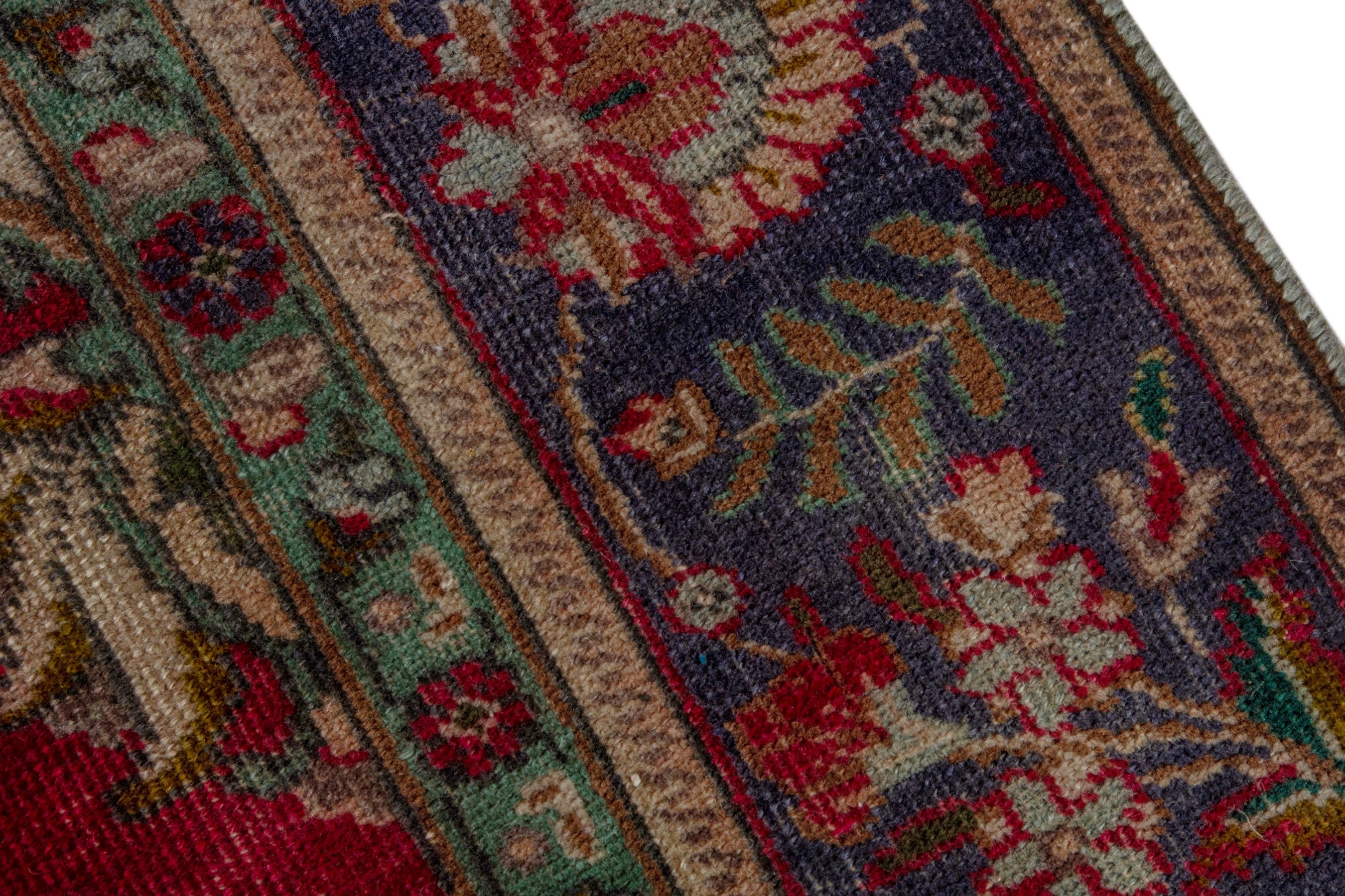 Persian Tabriz area rug in deep red and burgundy, view 7 of 18