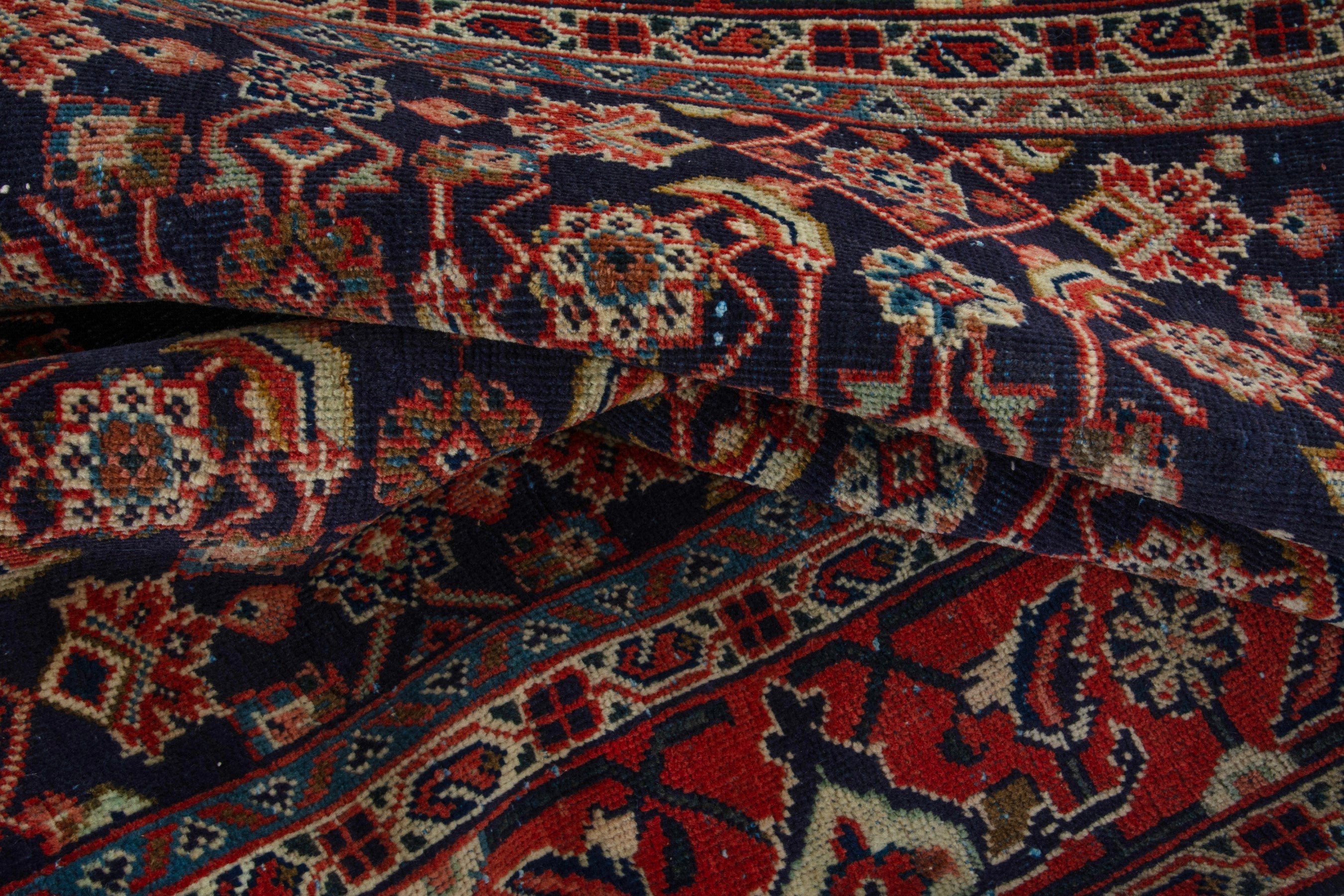 Persian Mahal area rug in navy and deep red, view 15 of 17