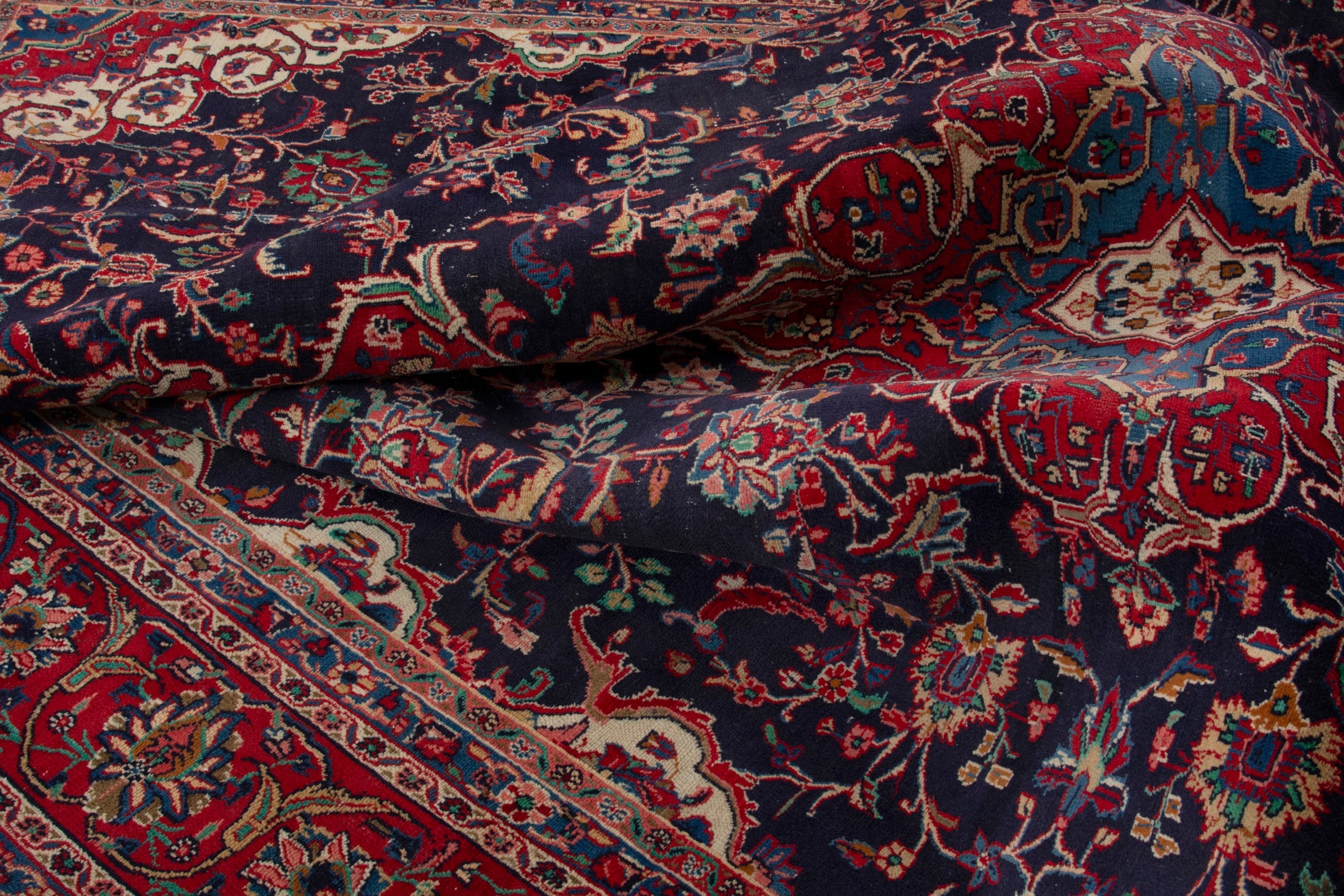 Persian Hamedan oversized rug in navy and deep red, view 17 of 18