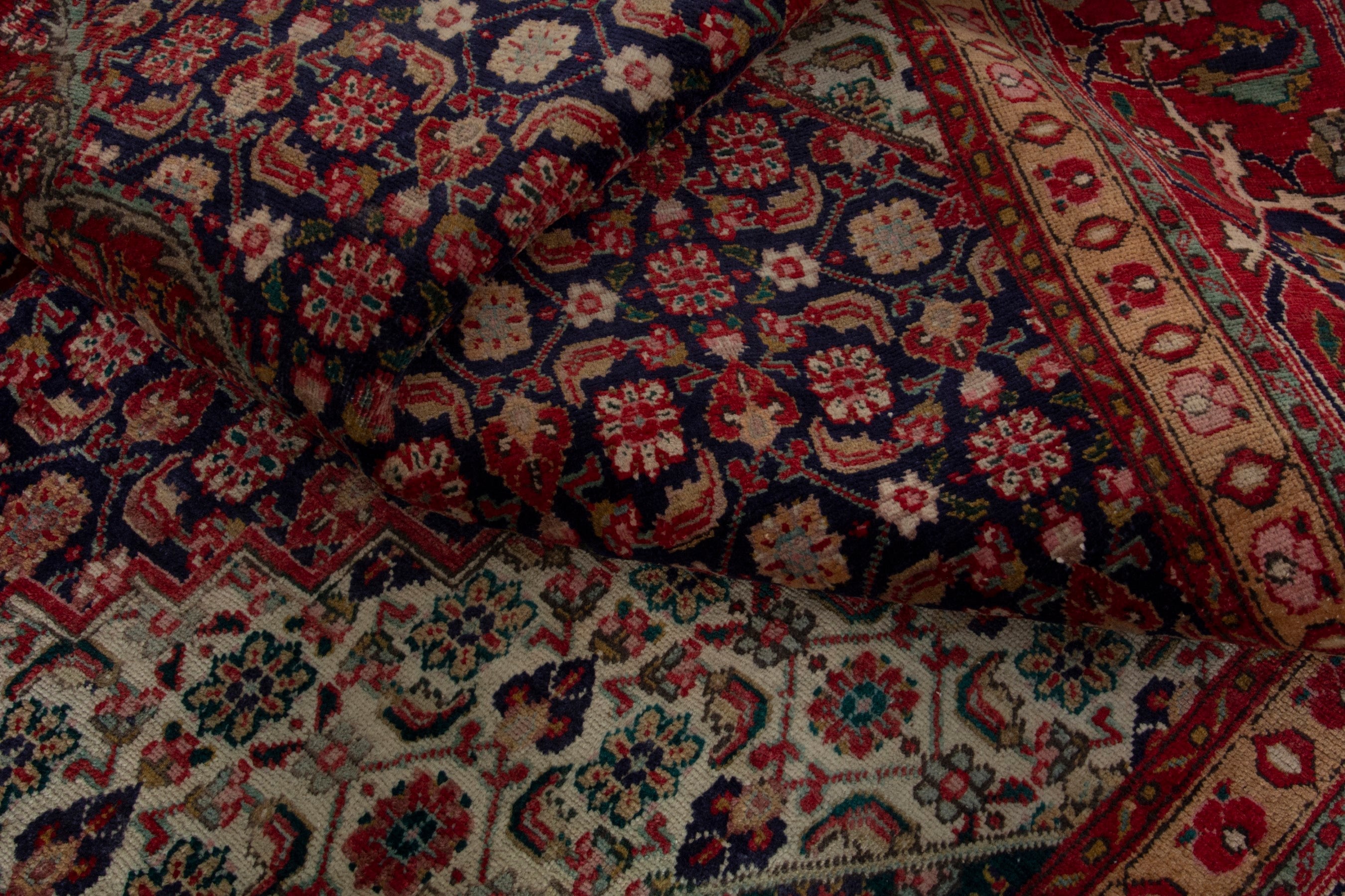 Persian Tabriz oversized rug in deep red and dark blue, view 15 of 18