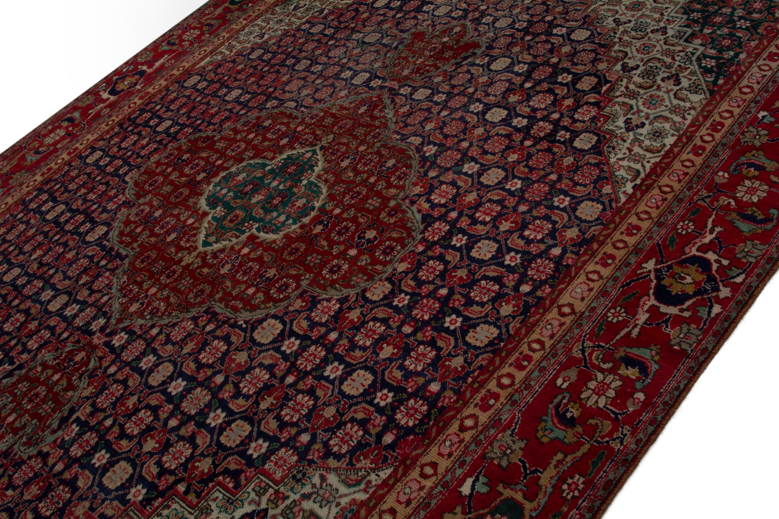 Persian Tabriz oversized rug in deep red and dark blue, view 4 of 18