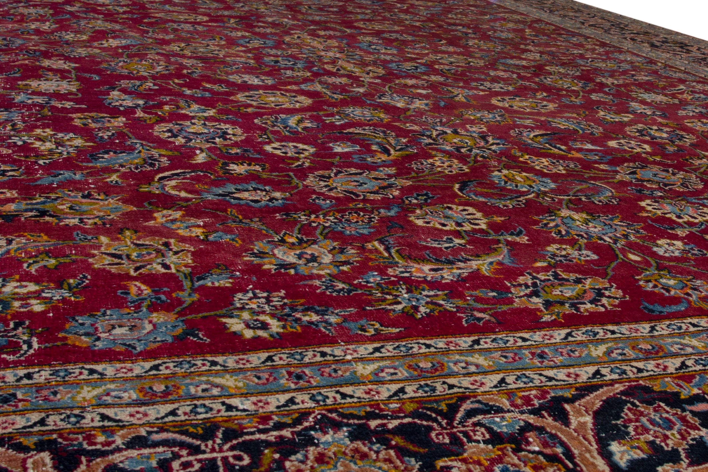 Persian Kashan oversized rug in deep red and dark brown, view 10 of 18