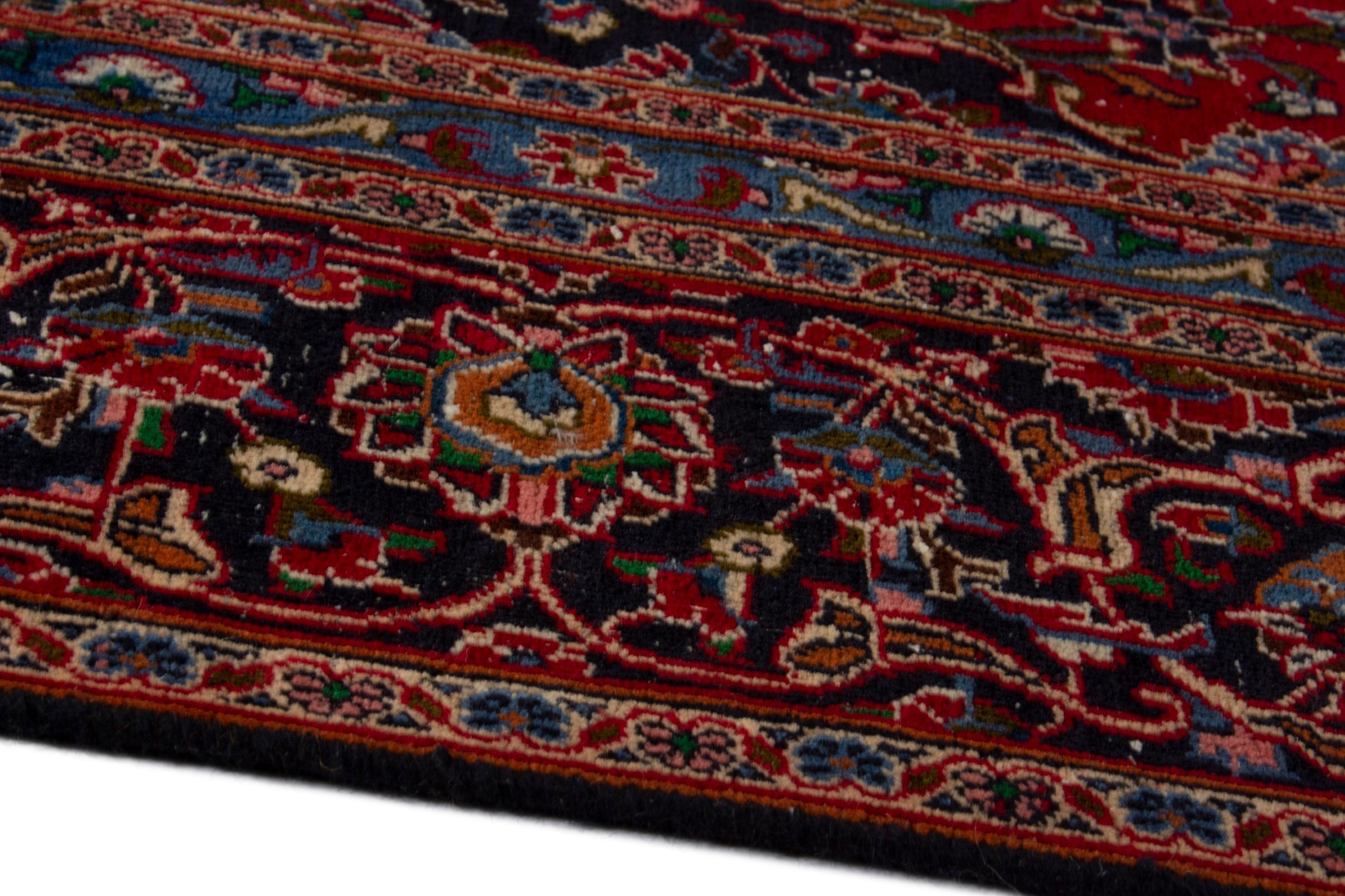 Persian Mashhad oversized rug in deep red and burgundy, view 8 of 18