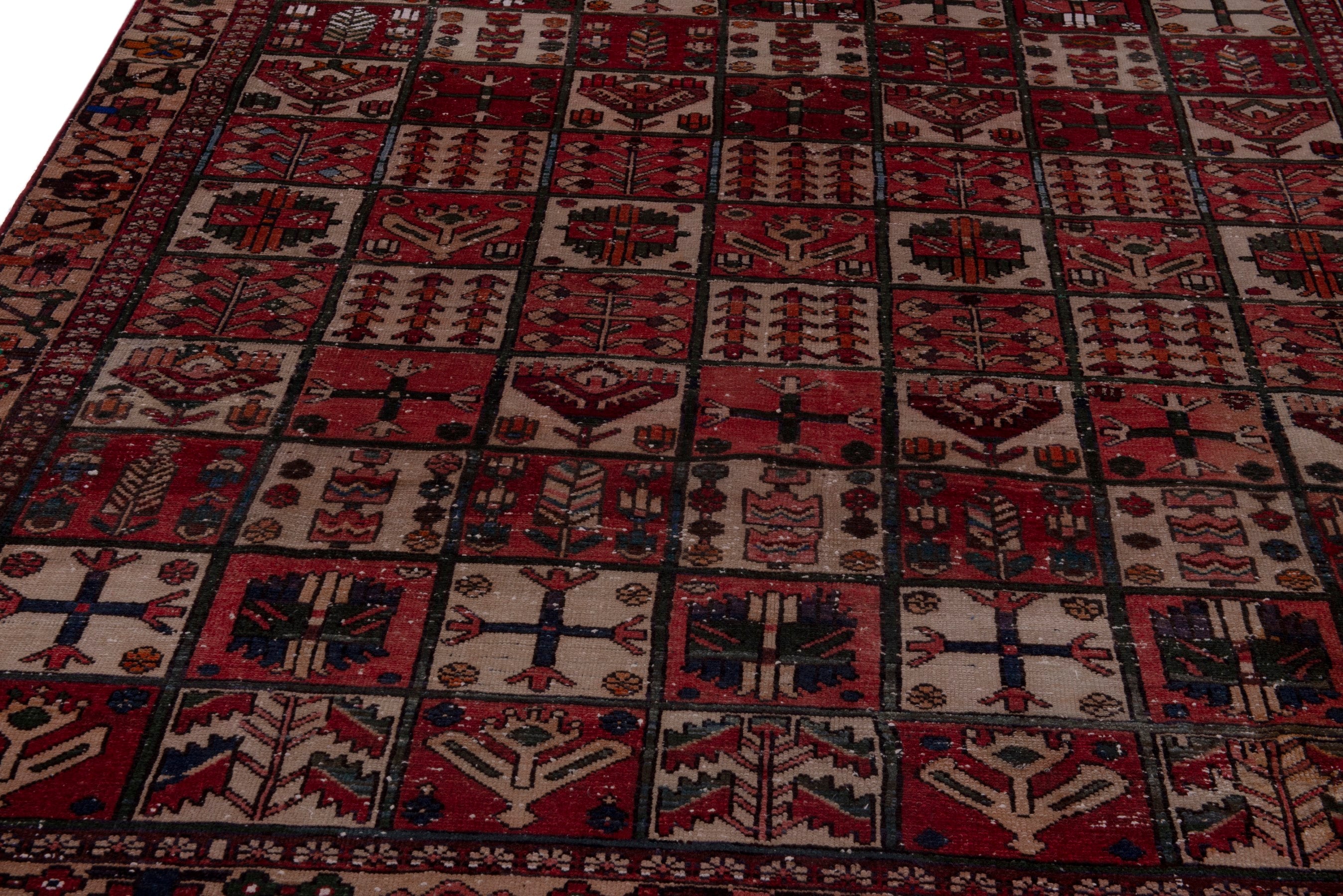 Persian Bakhtiari area rug in burgundy, view 10 of 20