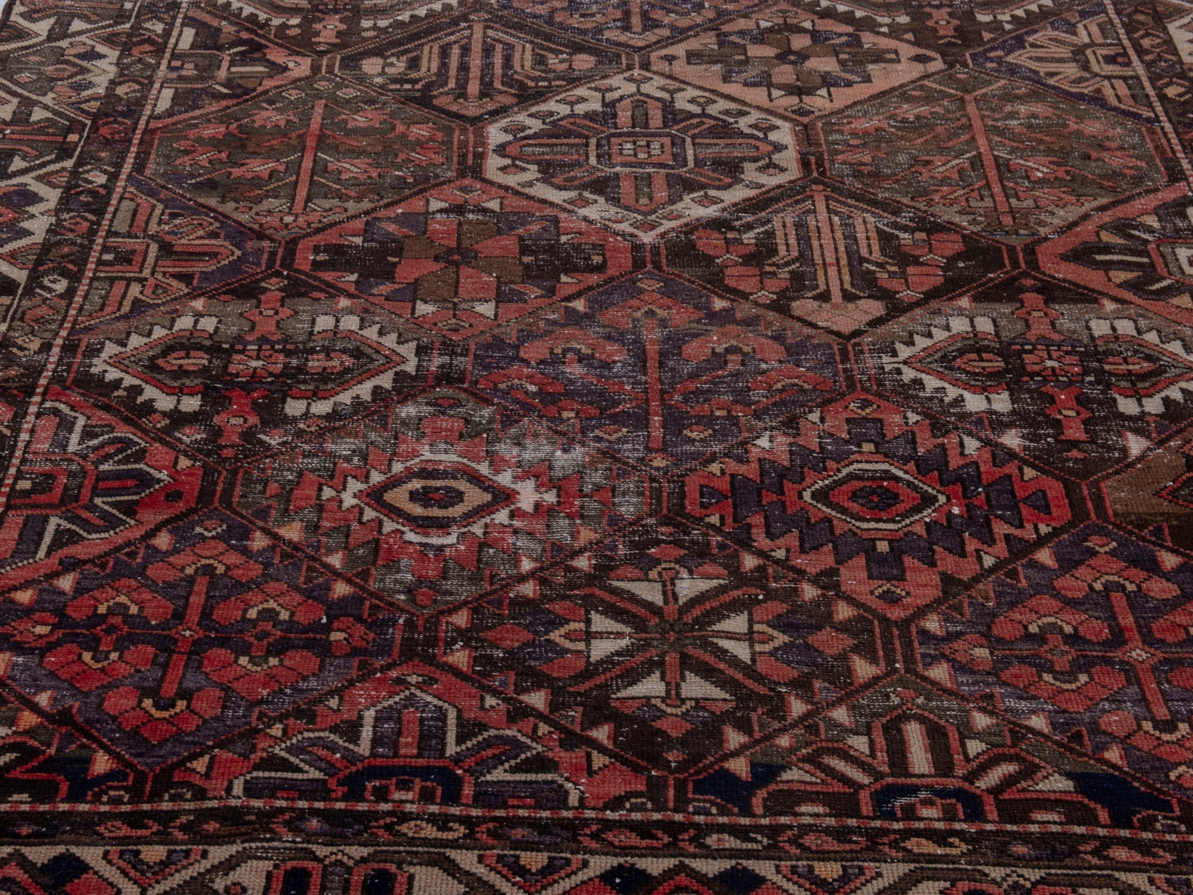 Persian Bakhtiari area rug in terracotta and charcoal, view 9 of 18