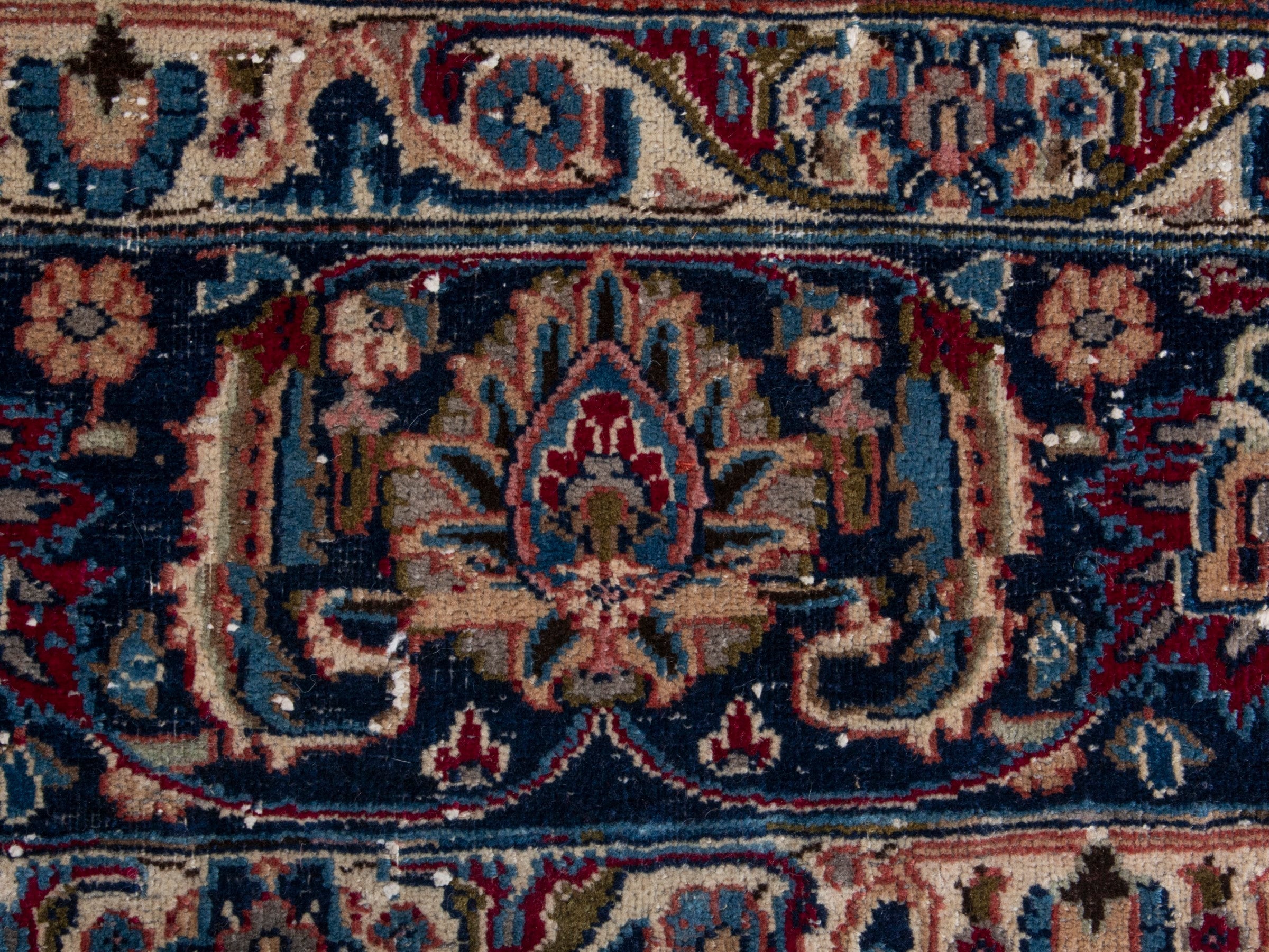 Persian Mashhad oversized rug in burgundy and navy, view 11 of 17