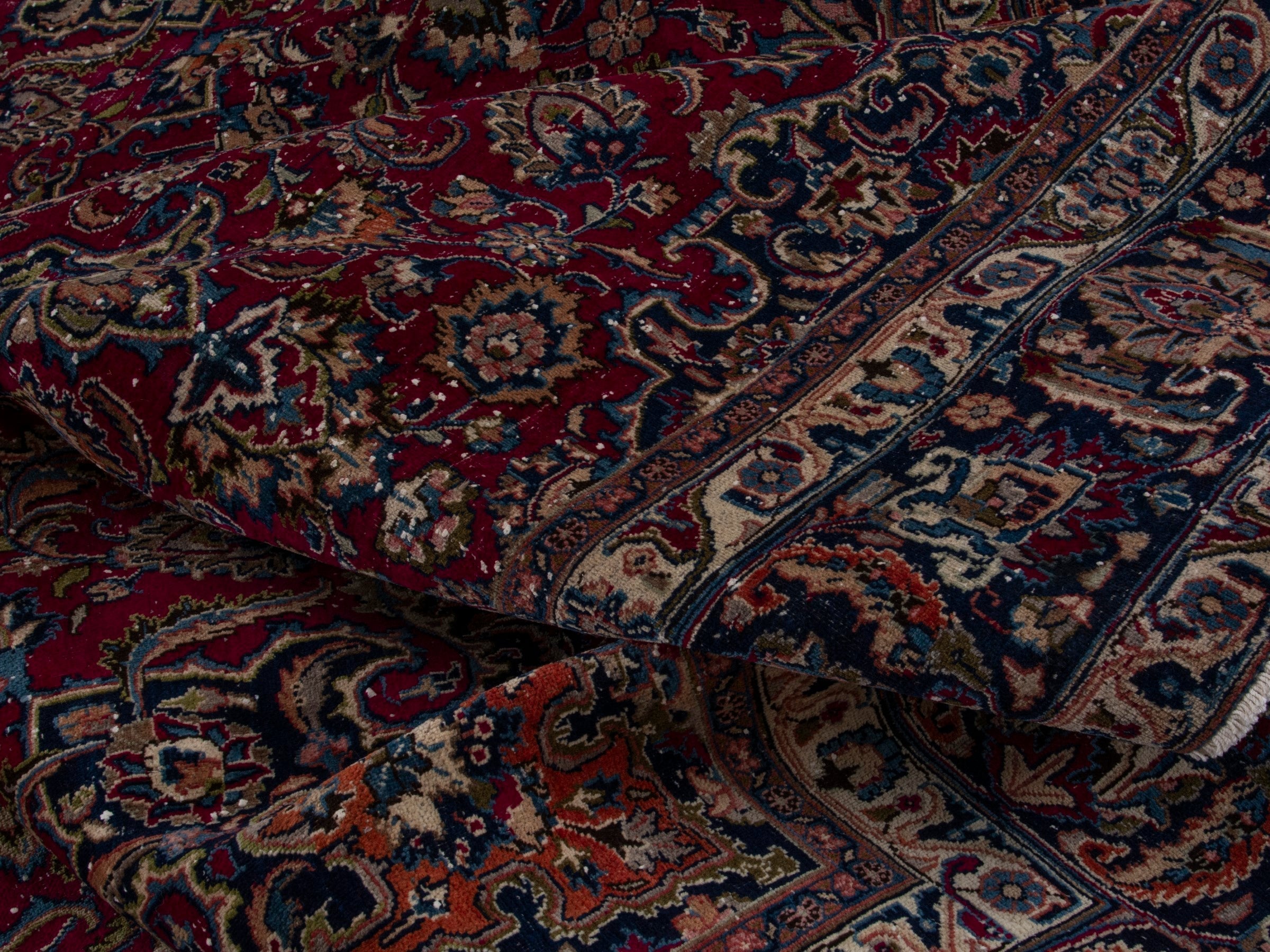 Persian Mashhad oversized rug in burgundy and navy, view 15 of 17