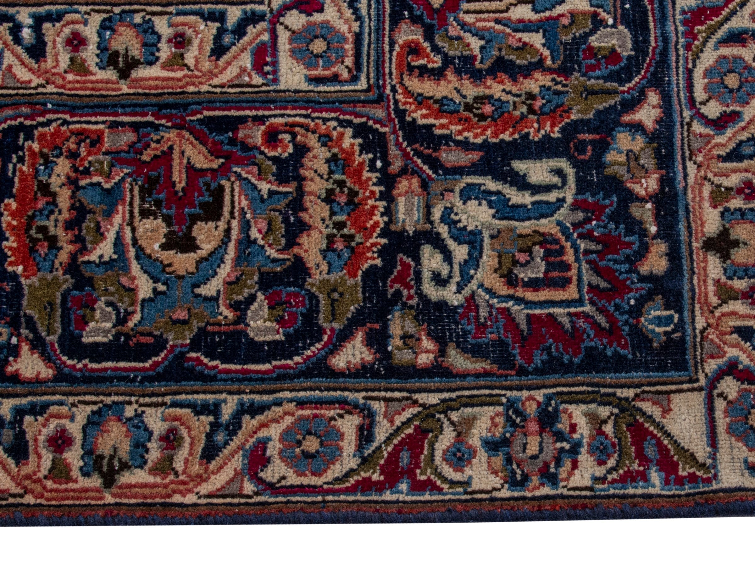 Persian Mashhad oversized rug in burgundy and navy, view 5 of 17