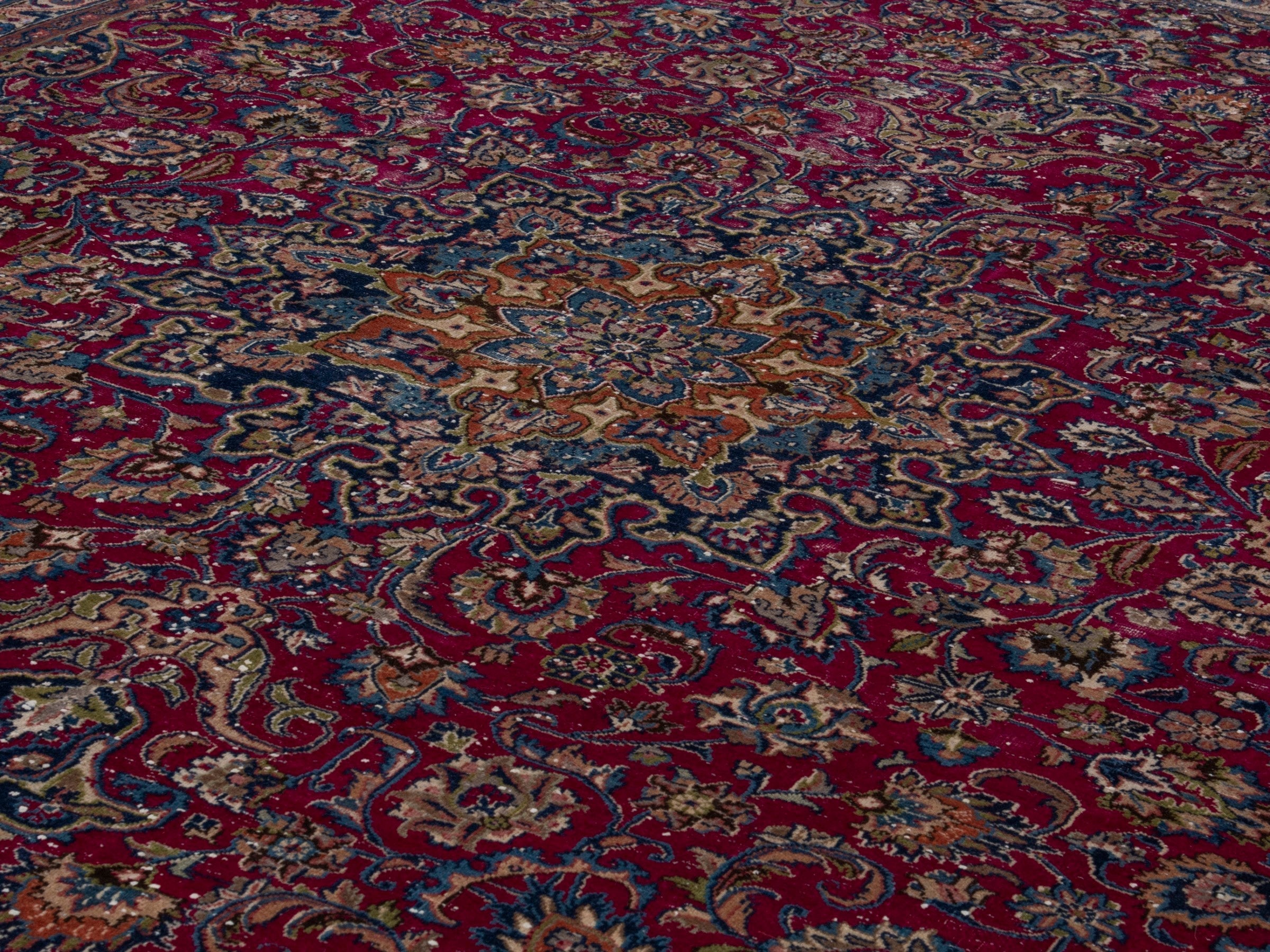 Persian Mashhad oversized rug in burgundy and navy, view 9 of 17