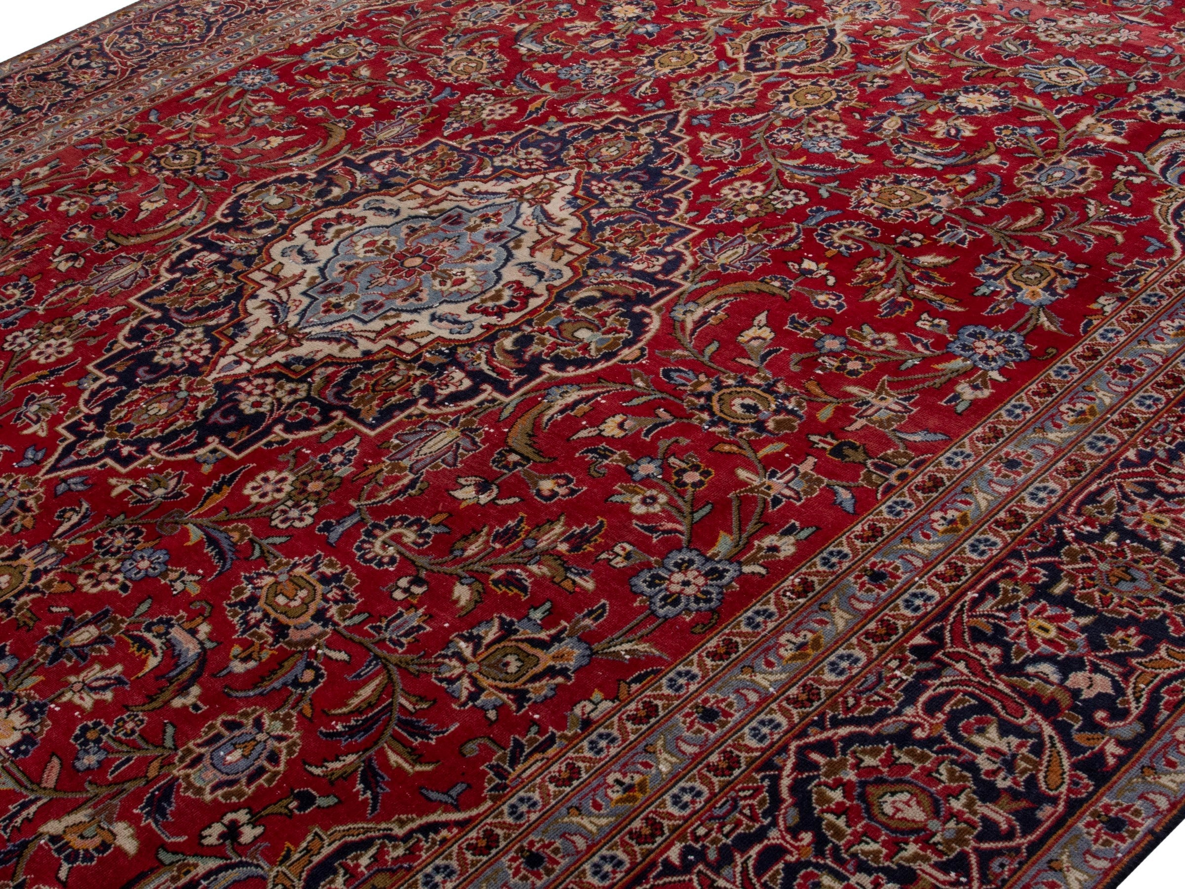 Persian Kashan oversized rug in deep red and dark brown, view 4 of 18