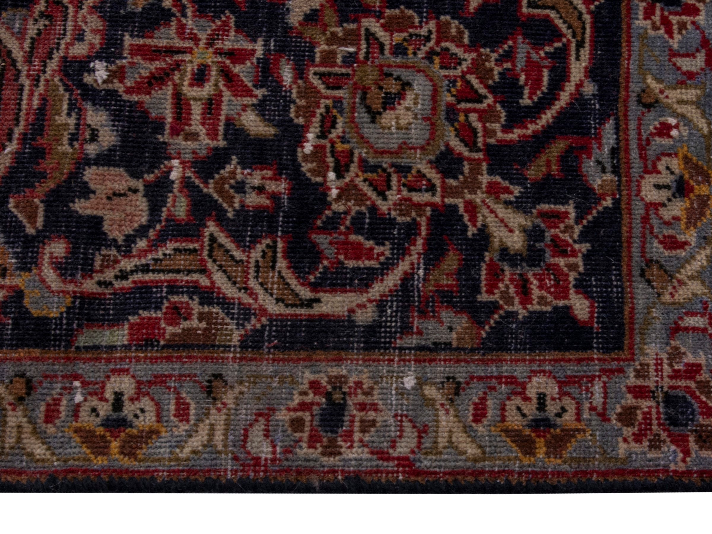Persian Kashan oversized rug in deep red and dark brown, view 5 of 18