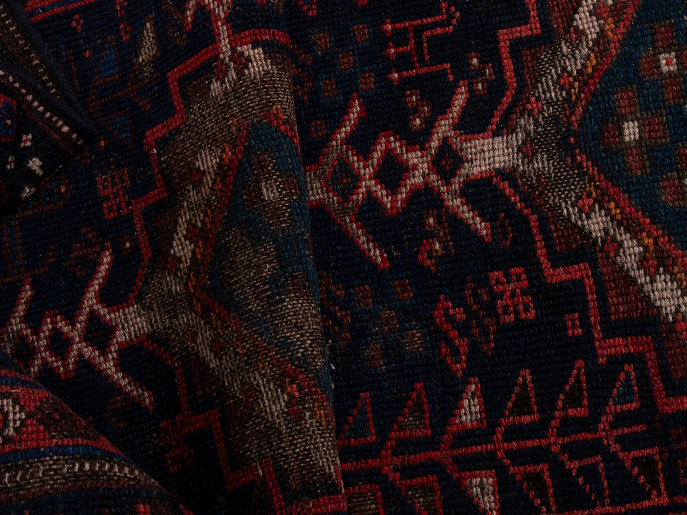 Persian Lori runner rug in navy and burgundy, view 14 of 17