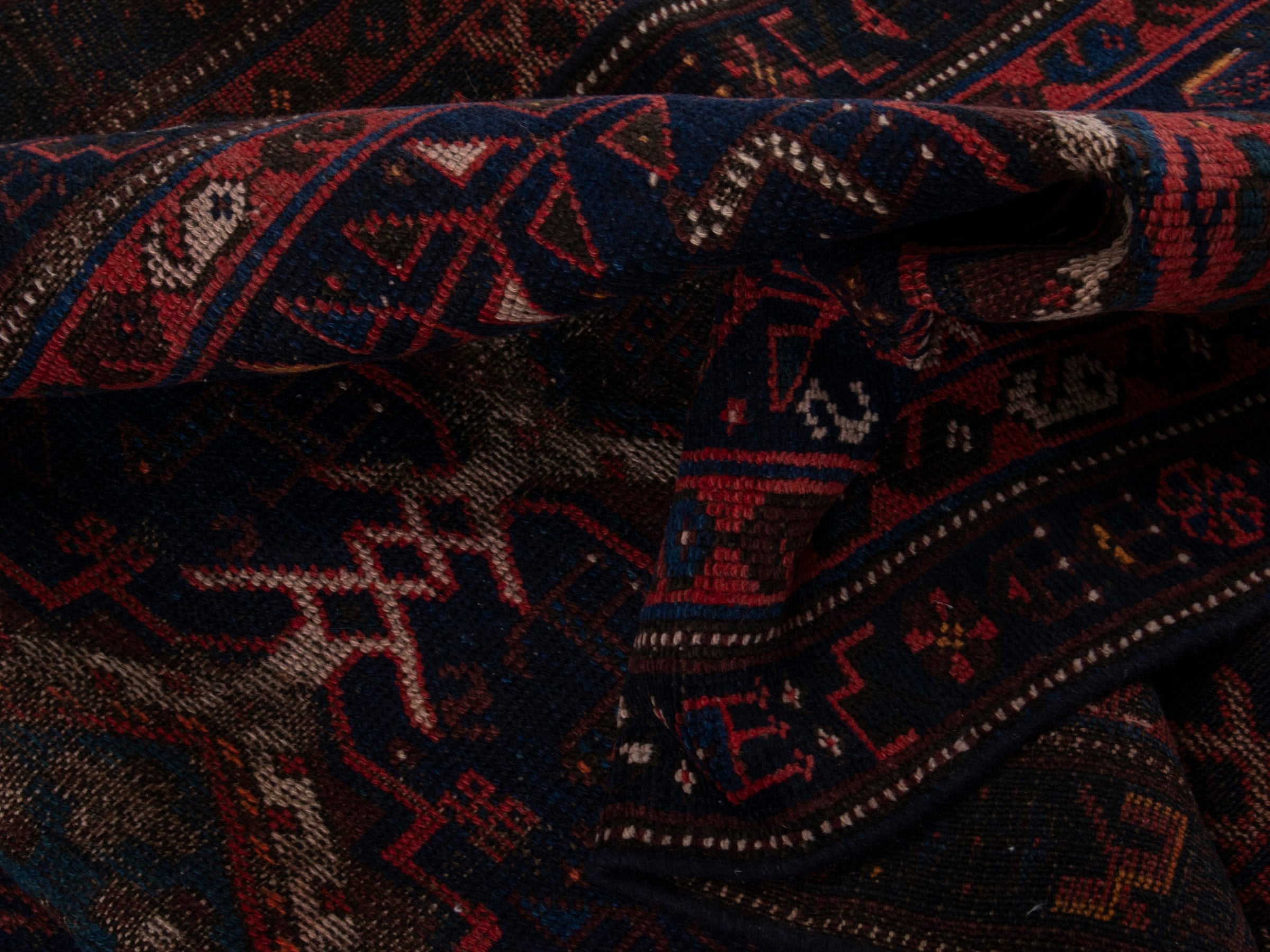 Persian Lori runner rug in navy and burgundy, view 15 of 17