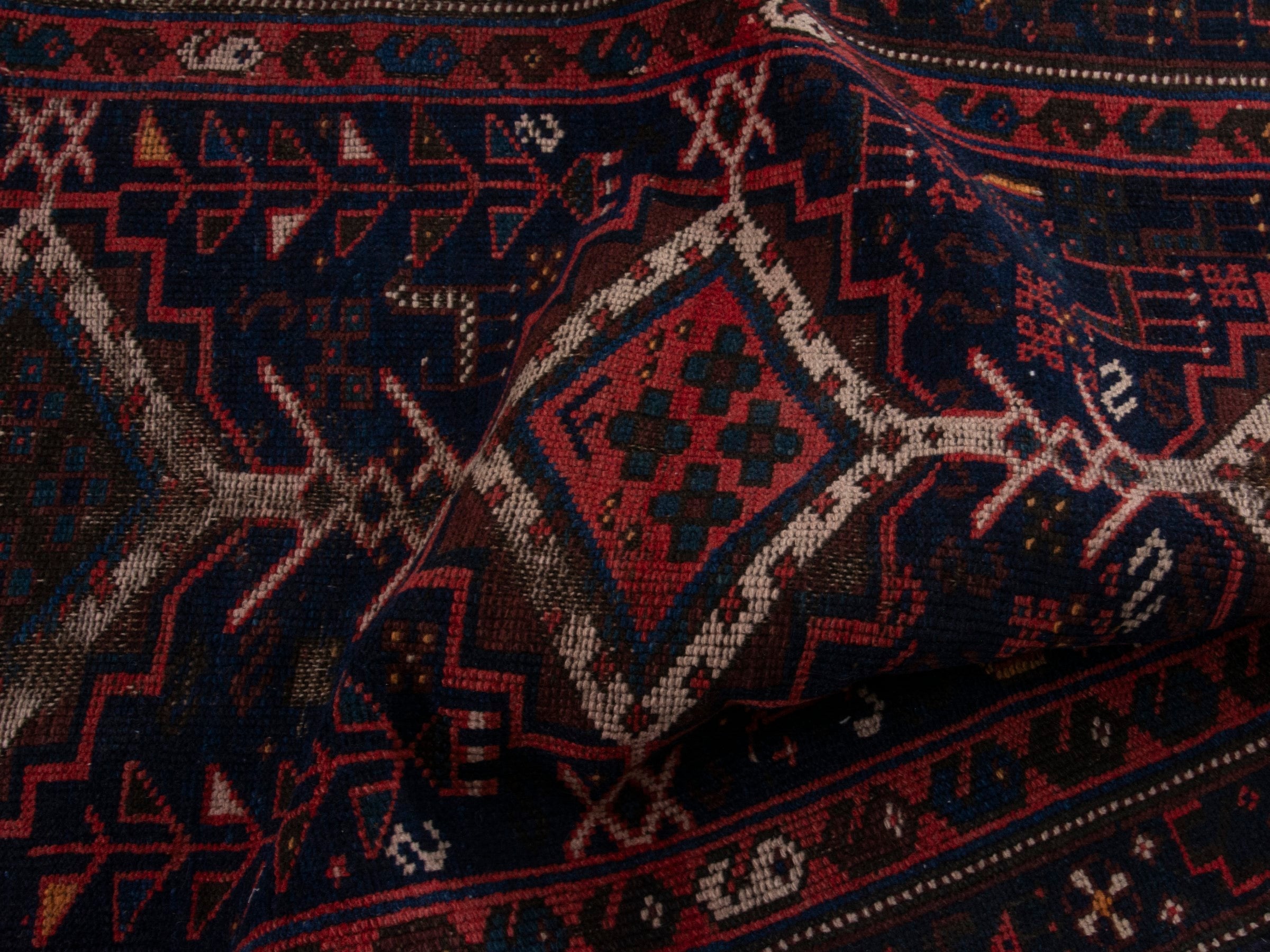 Persian Lori runner rug in navy and burgundy, view 16 of 17