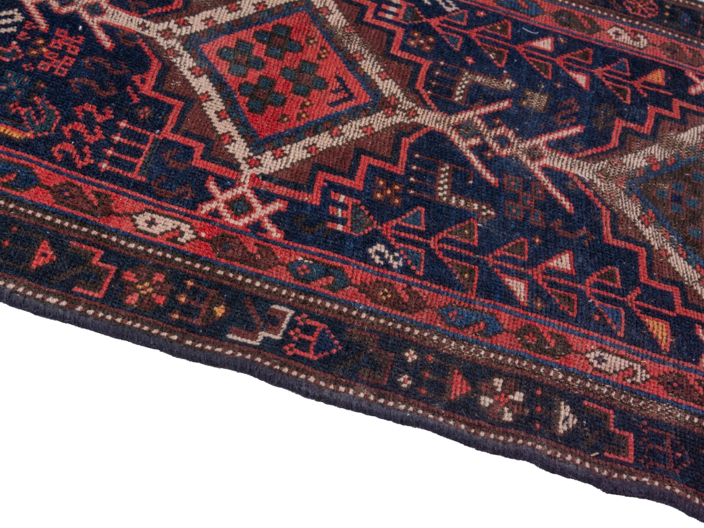 Persian Lori runner rug in navy and burgundy, view 7 of 17