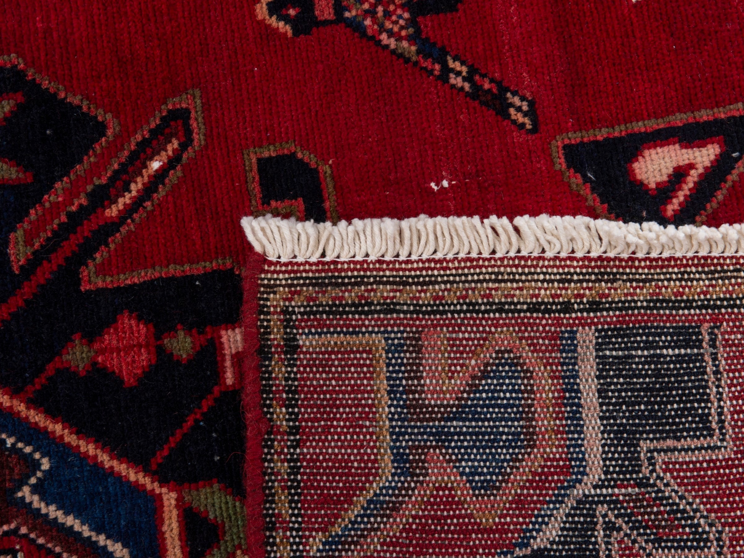 Persian Saveh runner rug in deep red and dark blue, view 17 of 17