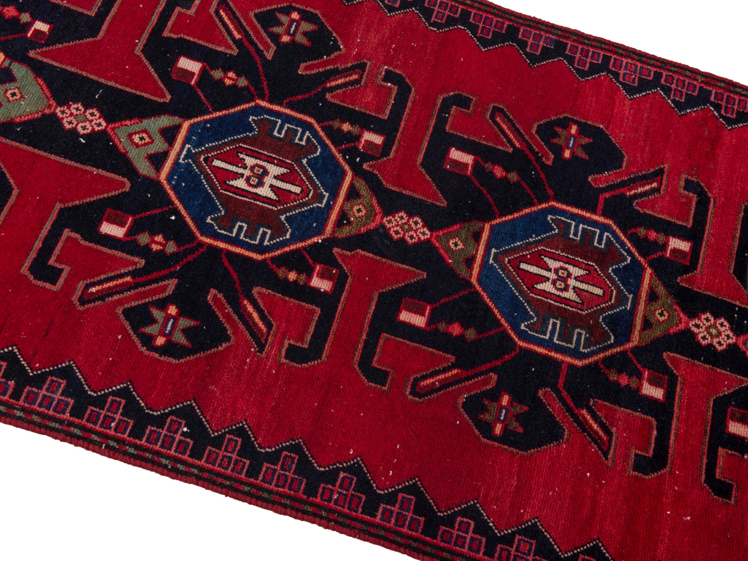 Persian Saveh runner rug in deep red and dark blue, view 4 of 17