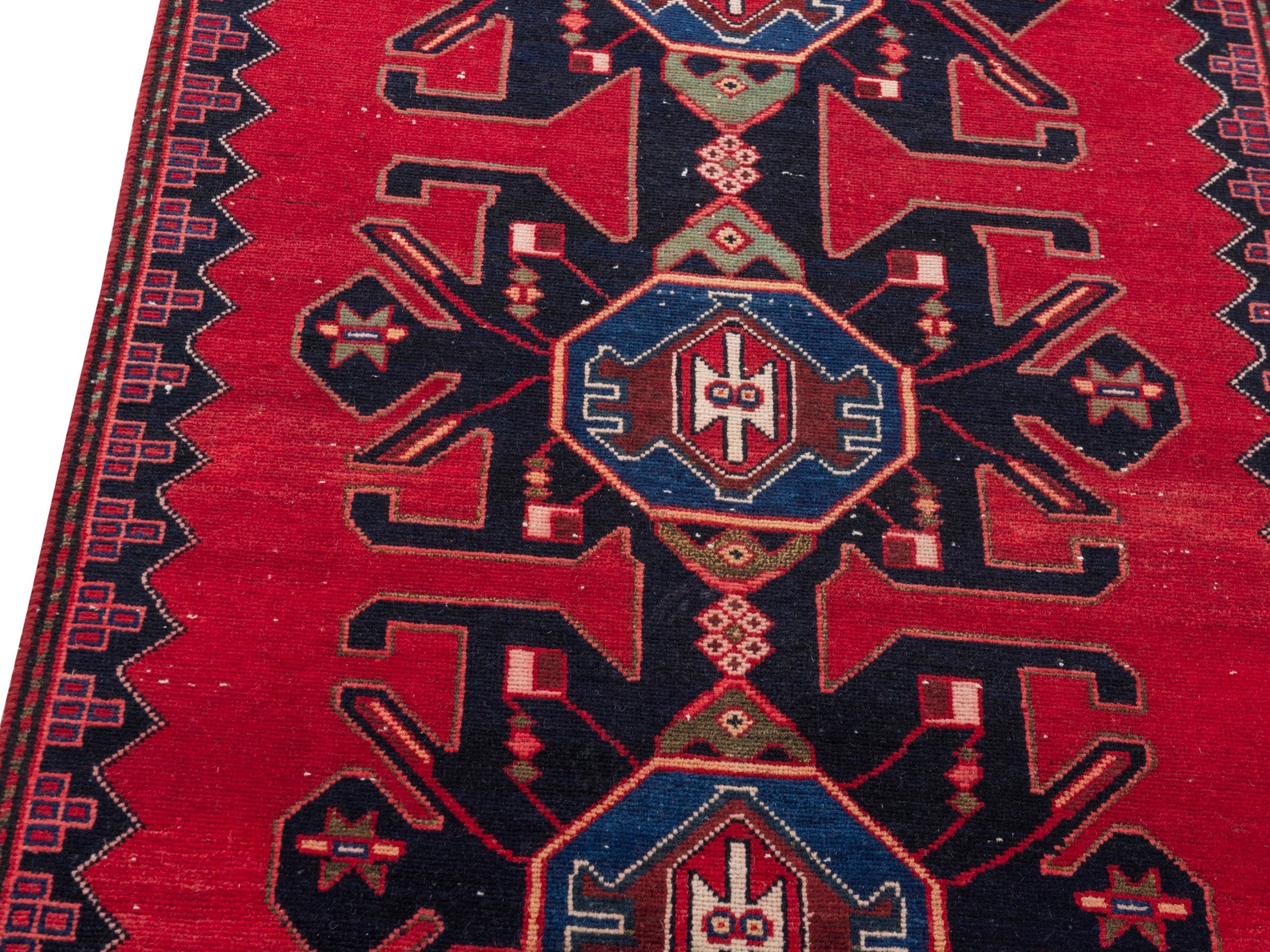 Persian Saveh runner rug in deep red and dark blue, view 7 of 17