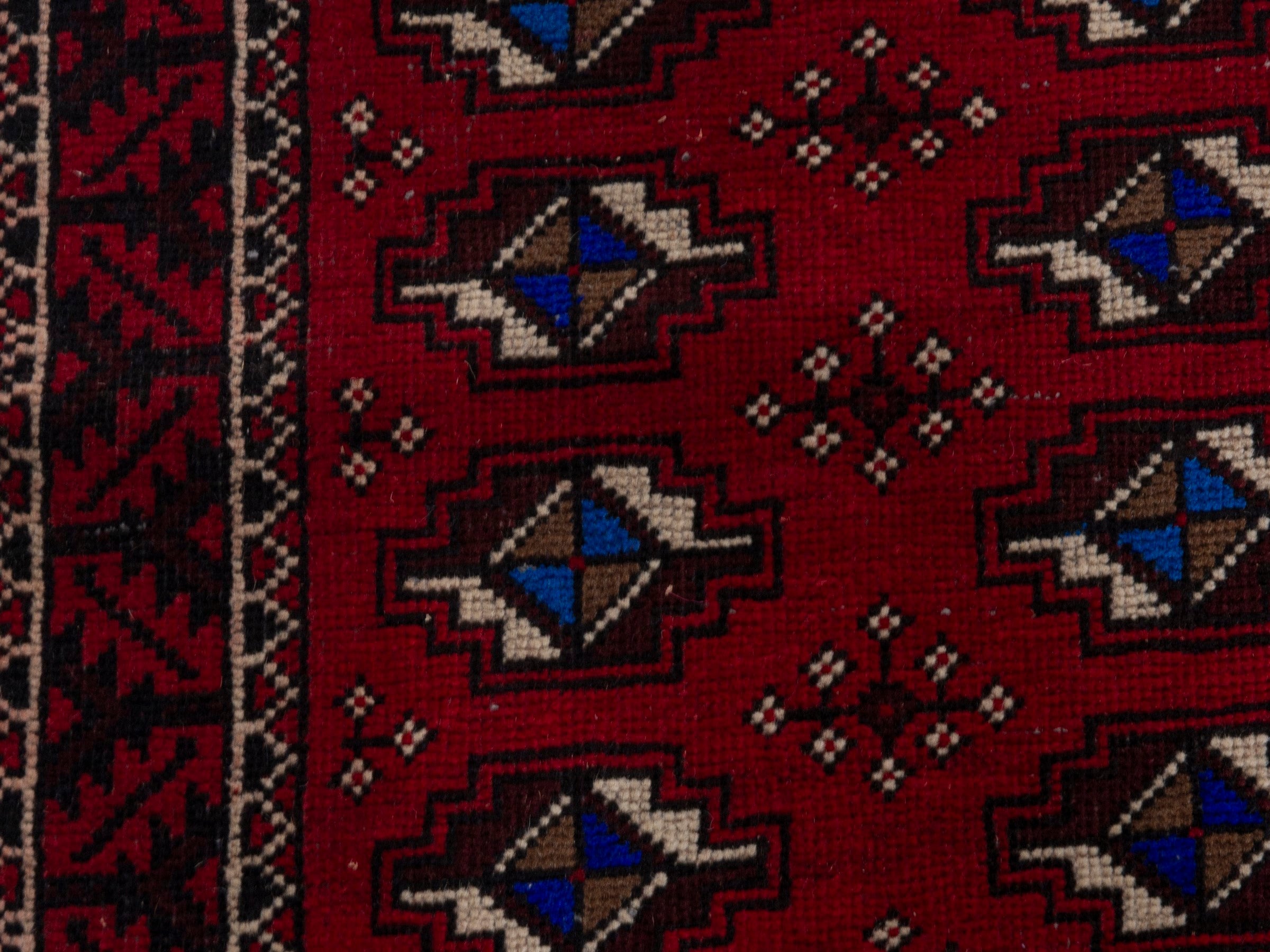 Persian Baluch runner rug in deep red and navy, view 12 of 17