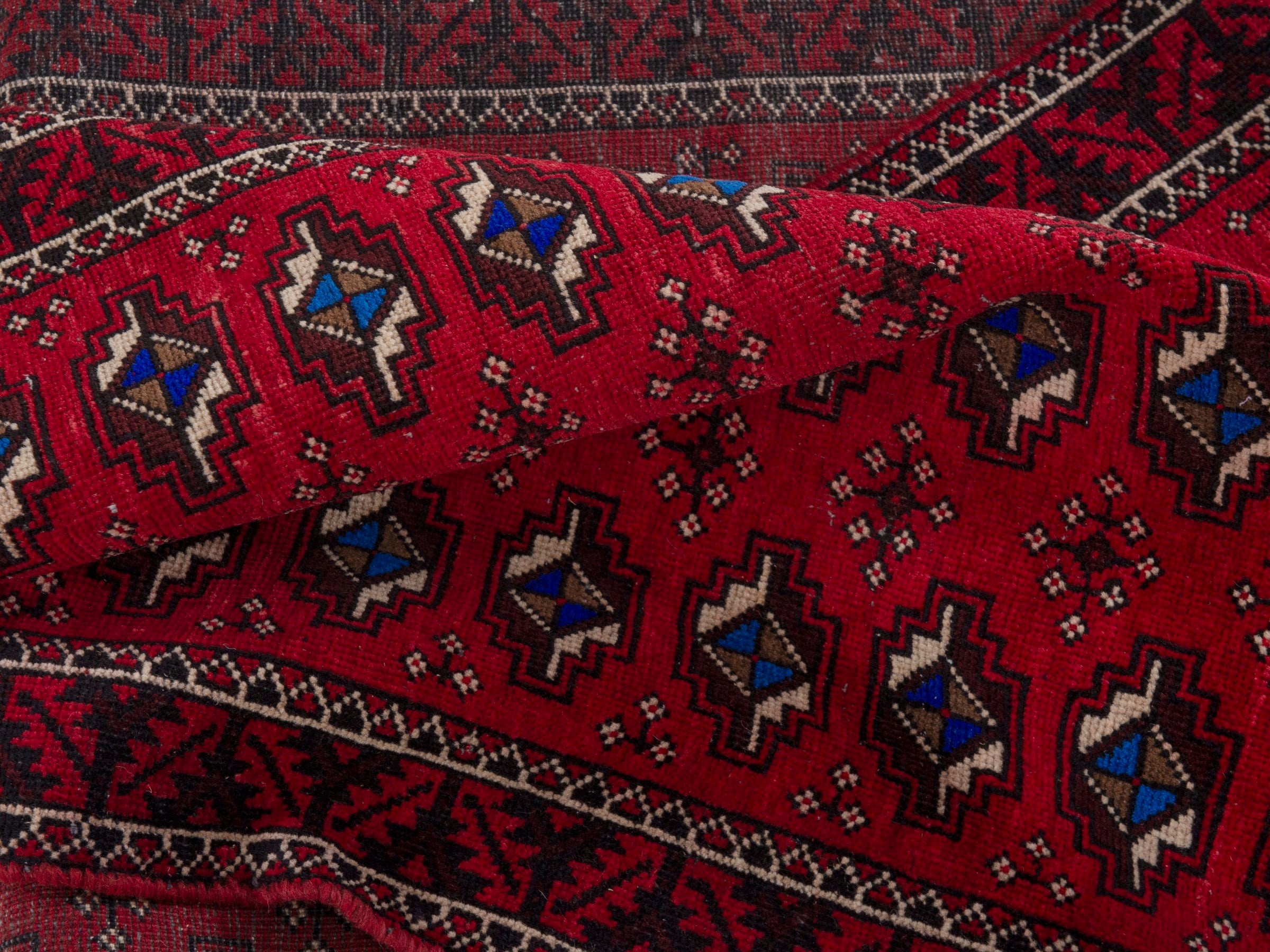 Persian Baluch runner rug in deep red and navy, view 15 of 17