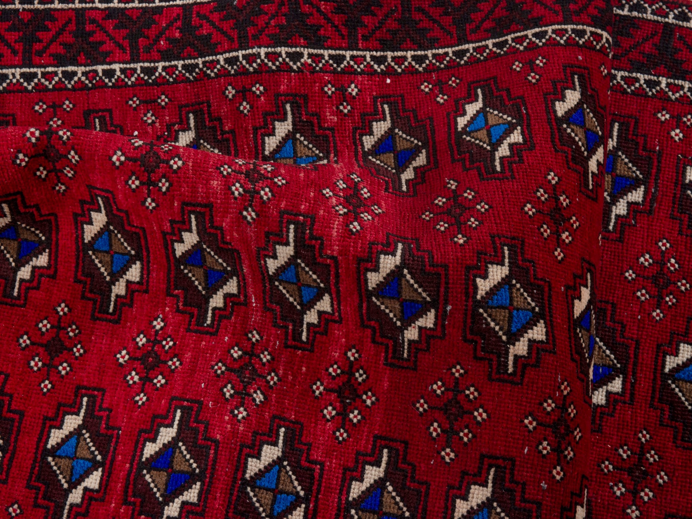 Persian Baluch runner rug in deep red and navy, view 16 of 17