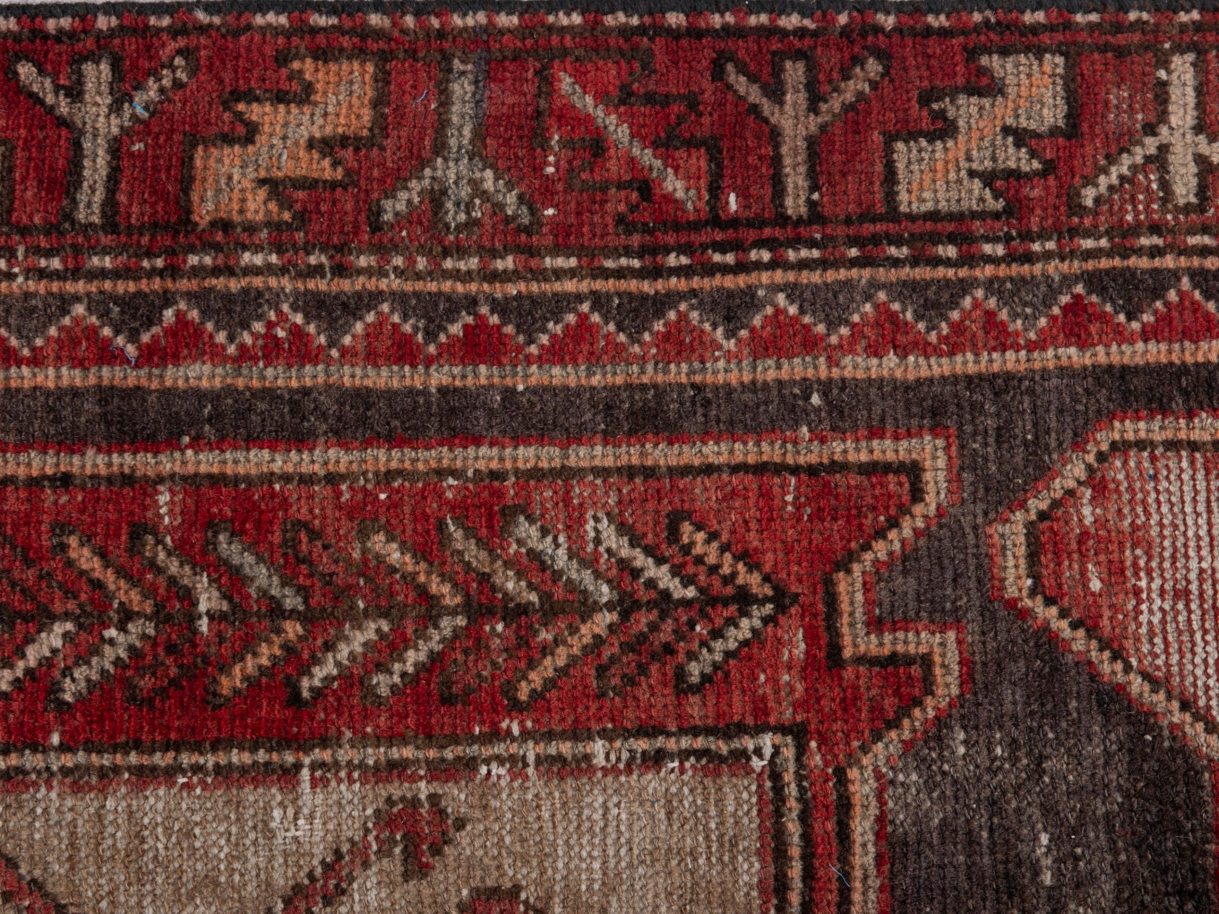 Persian Saveh runner rug in deep red and charcoal, view 14 of 18
