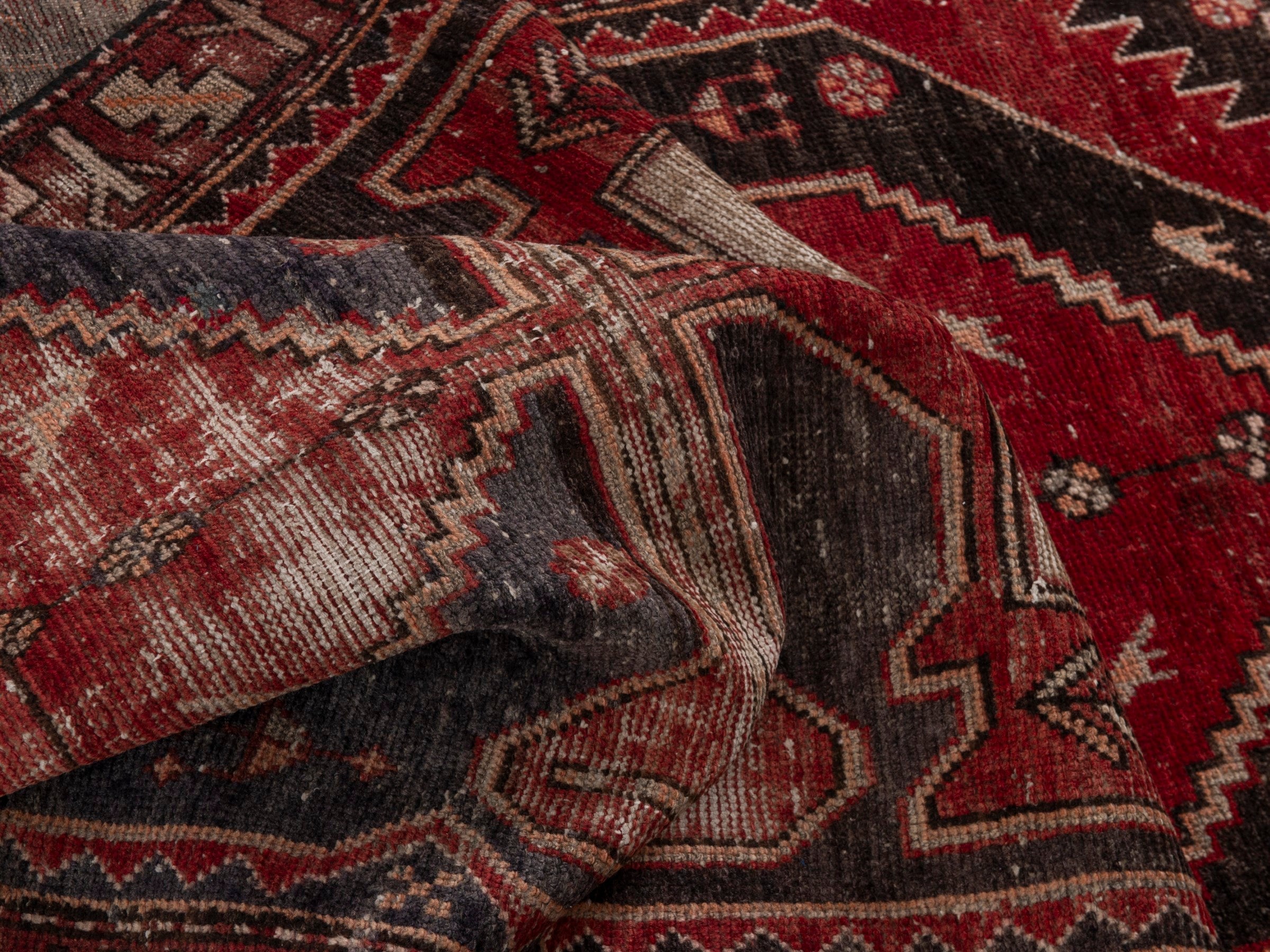Persian Saveh runner rug in deep red and charcoal, view 15 of 18