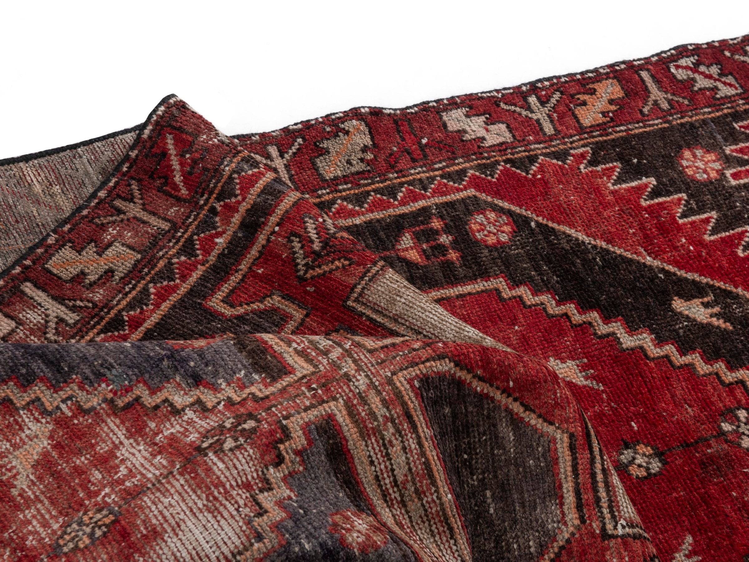 Persian Saveh runner rug in deep red and charcoal, view 16 of 18