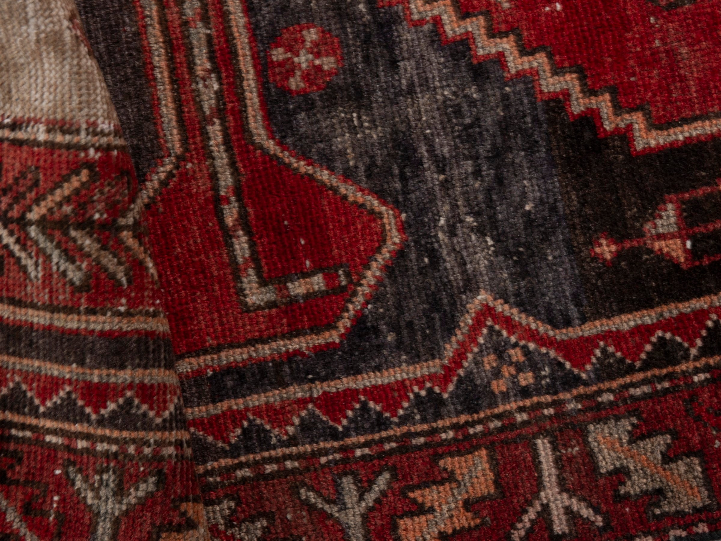 Persian Saveh runner rug in deep red and charcoal, view 17 of 18