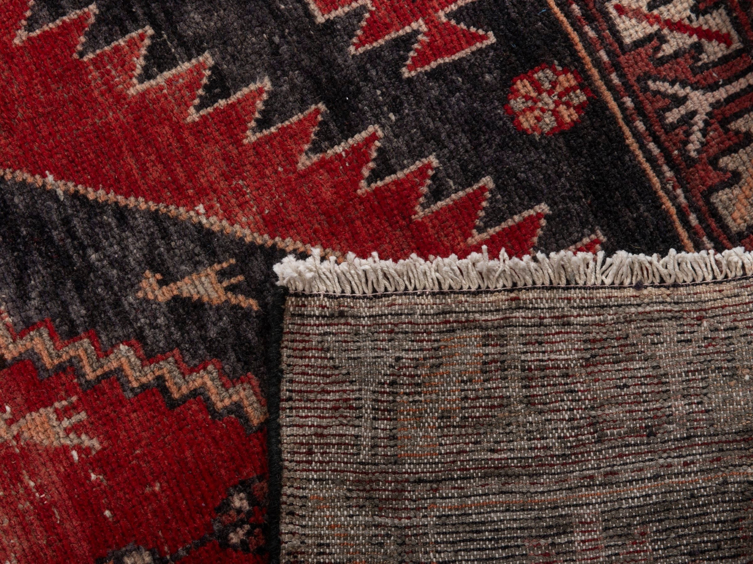 Persian Saveh runner rug in deep red and charcoal, view 18 of 18
