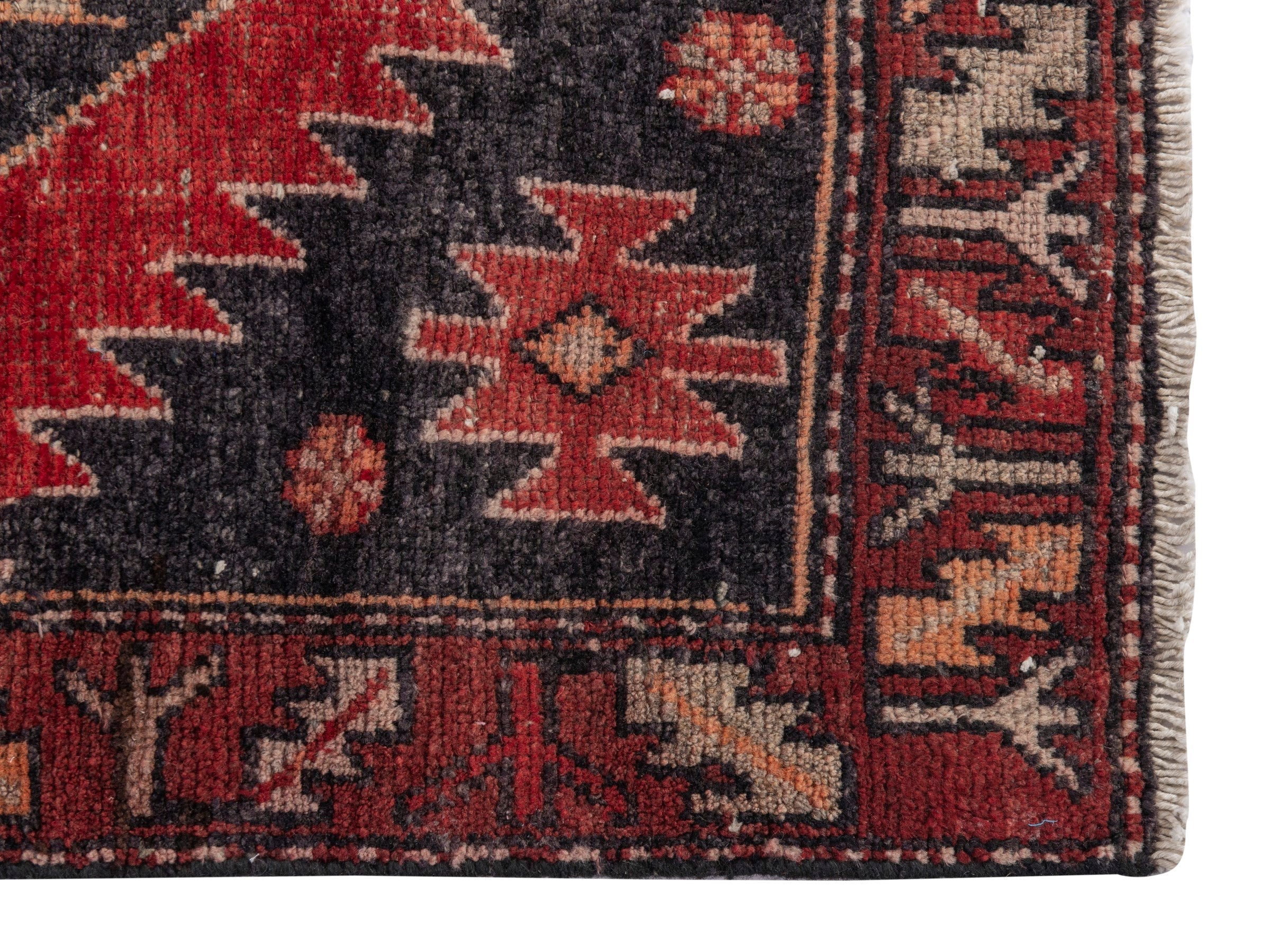 Persian Saveh runner rug in deep red and charcoal, view 5 of 18