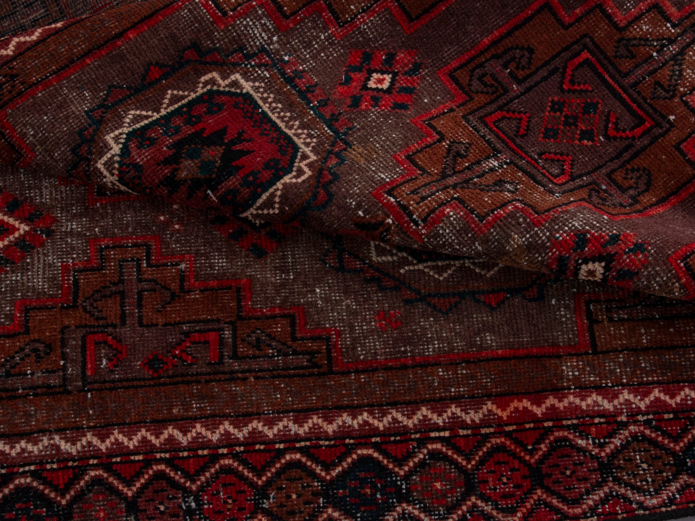 Persian Baluch runner rug in burgundy and deep red, view 16 of 17