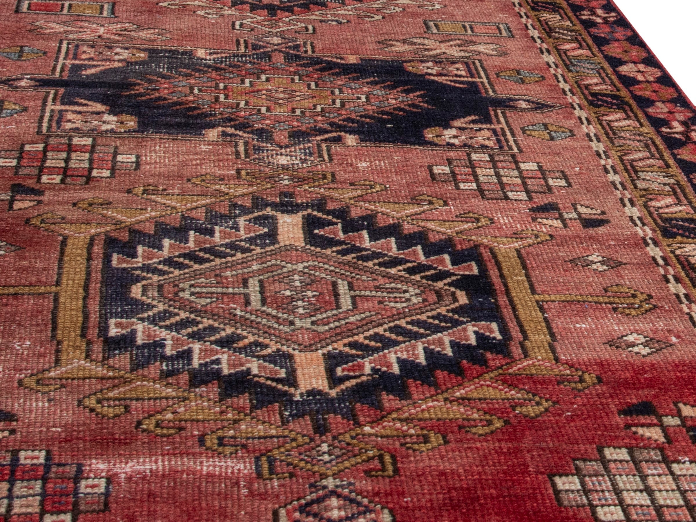Persian Gharajeh runner rug in rust and burgundy, view 10 of 17