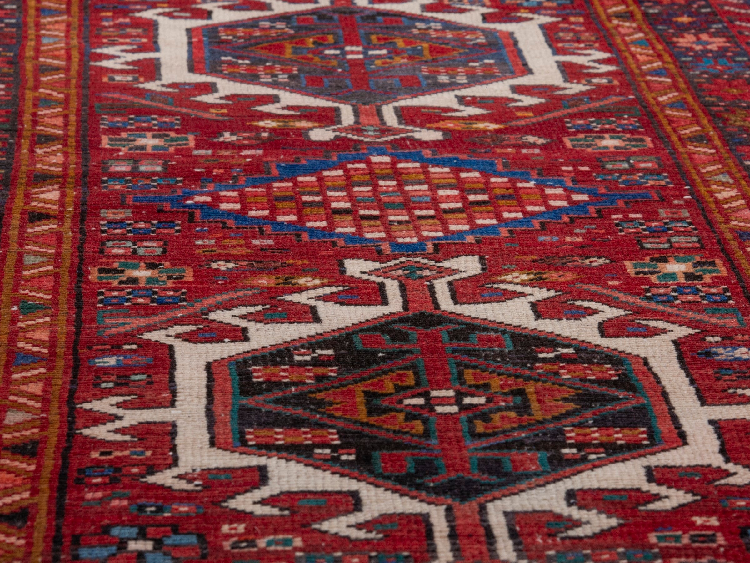 Persian Gharajeh runner rug in deep red and burgundy, view 10 of 17