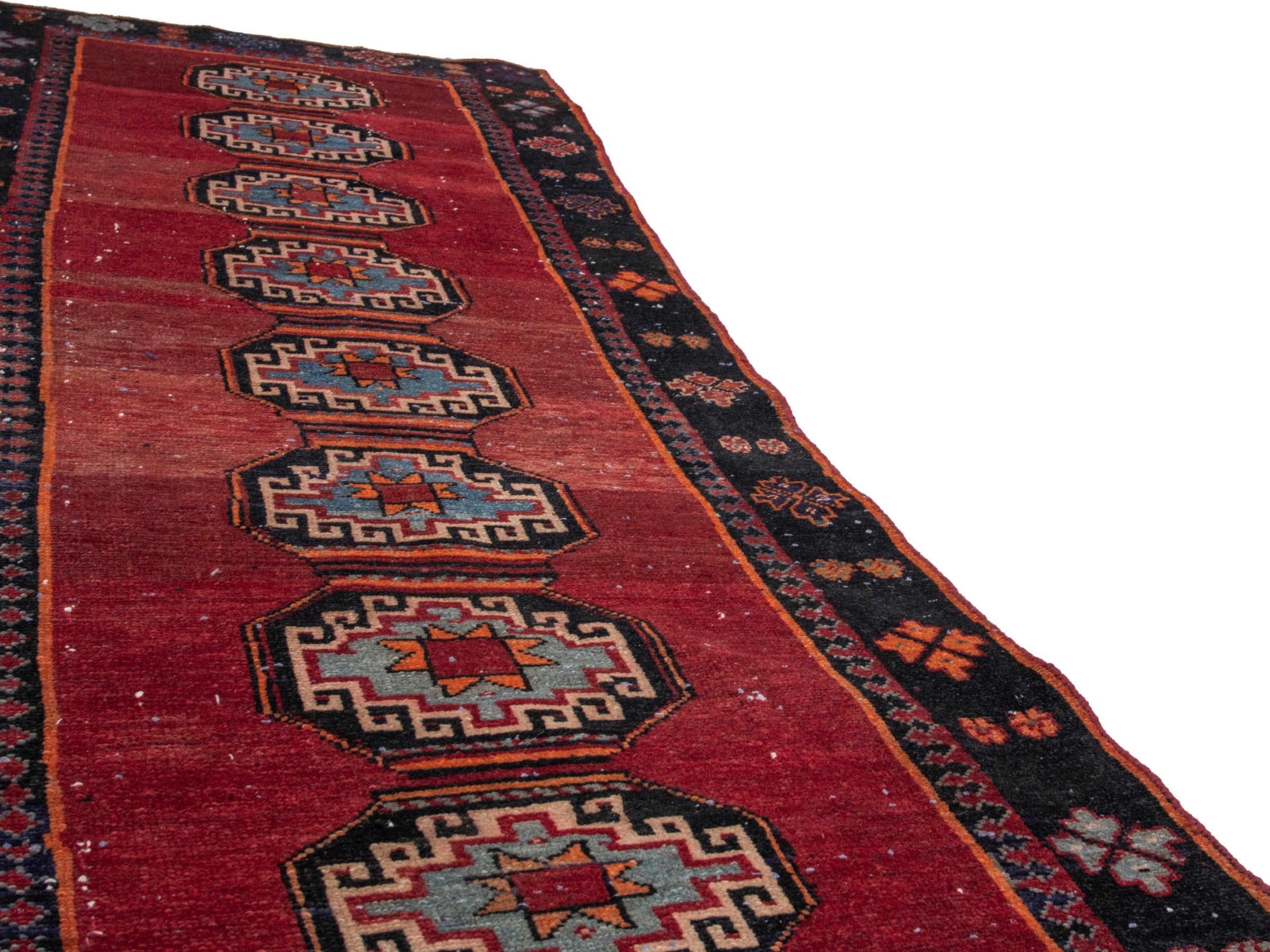 Persian Saveh runner rug in deep red and navy, view 10 of 17