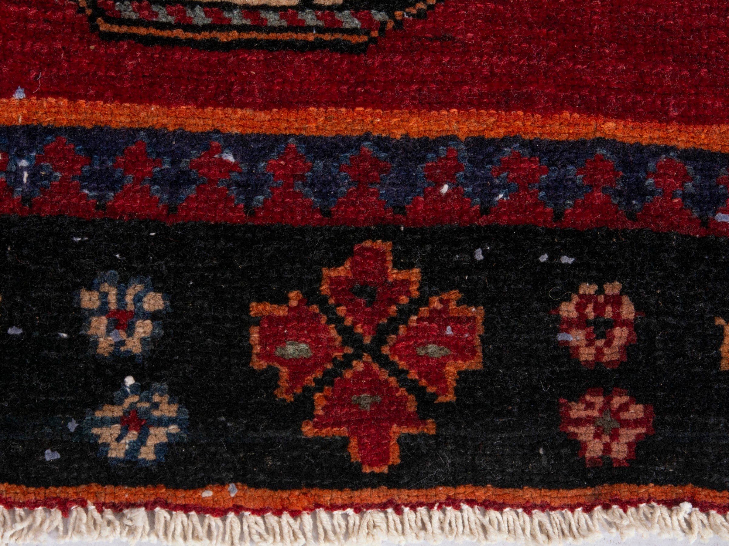 Persian Saveh runner rug in deep red and navy, view 11 of 17