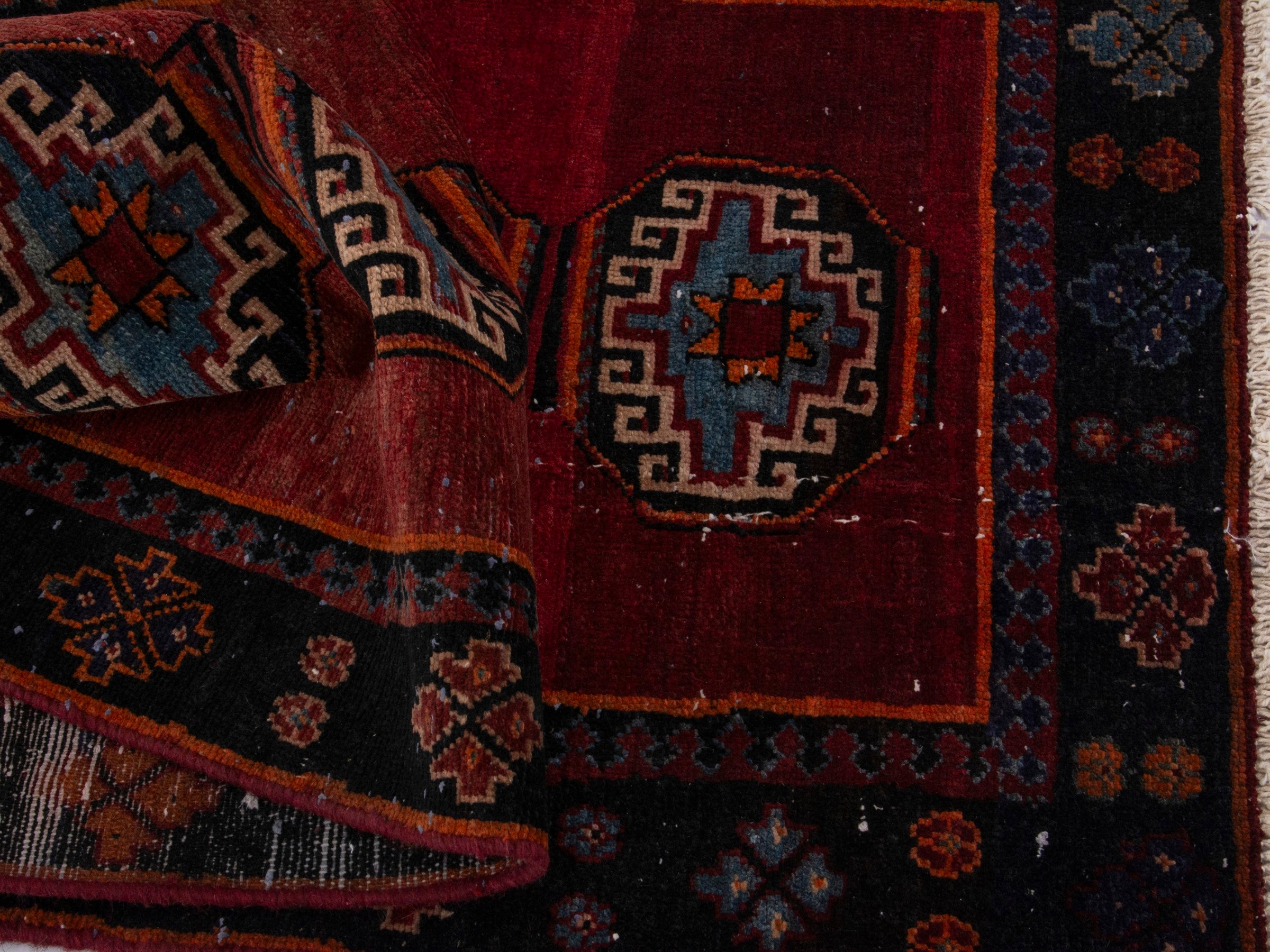 Persian Saveh runner rug in deep red and navy, view 14 of 17