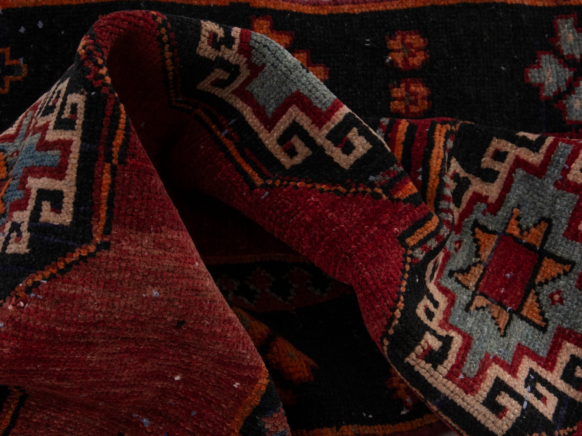 Persian Saveh runner rug in deep red and navy, view 15 of 17