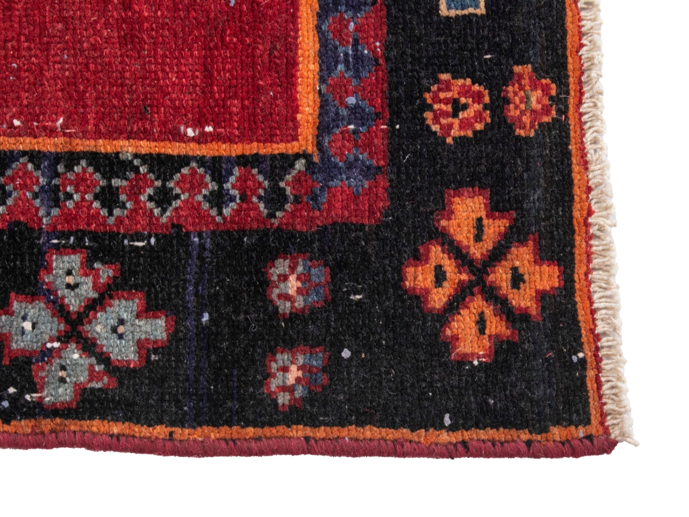 Persian Saveh runner rug in deep red and navy, view 5 of 17
